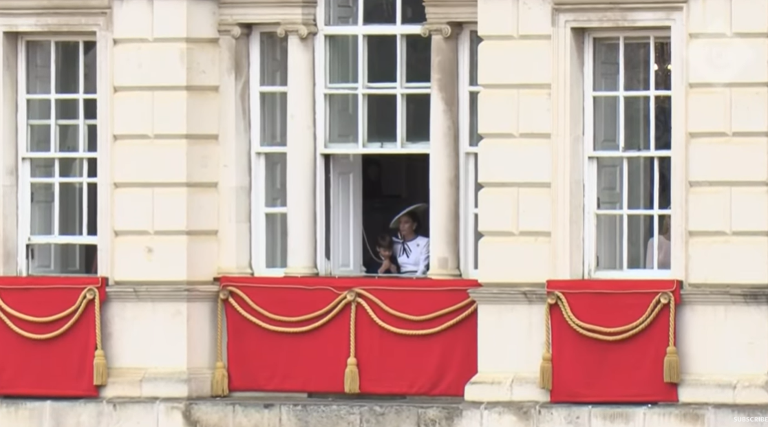Prince Louis plays with a curtain string beside his mother Princess Catherine of Wales, June 2024. | Source: YouTube/telegraph