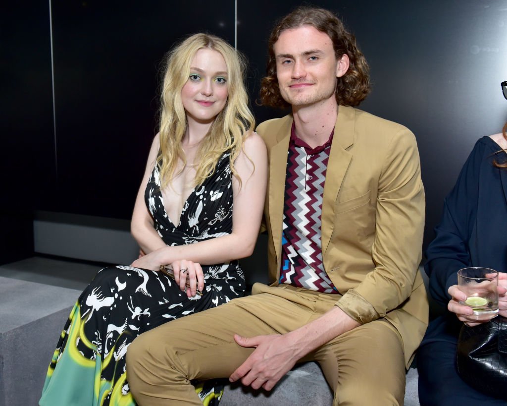 Dakota Fanning and Henry Frye attends the Prada Resort 2019 fashion show in New York City on May 4, 2018 | Photo: Getty Images