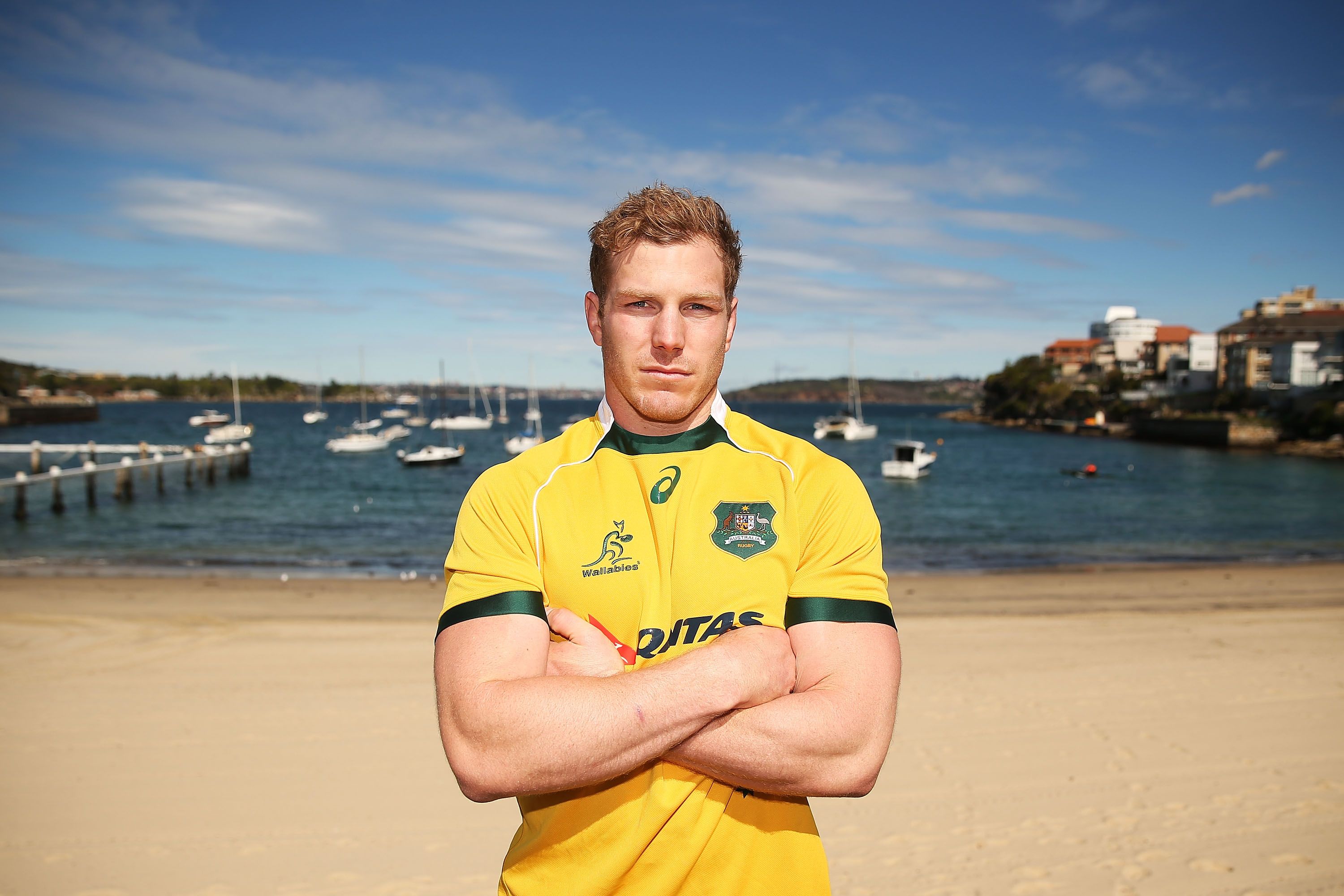 David Pocock of the Wallabies poses following an Australian Wallabies training session at Little Manly Beach on August 28, 2015 in Sydney, Australia | Photo: Getty Images