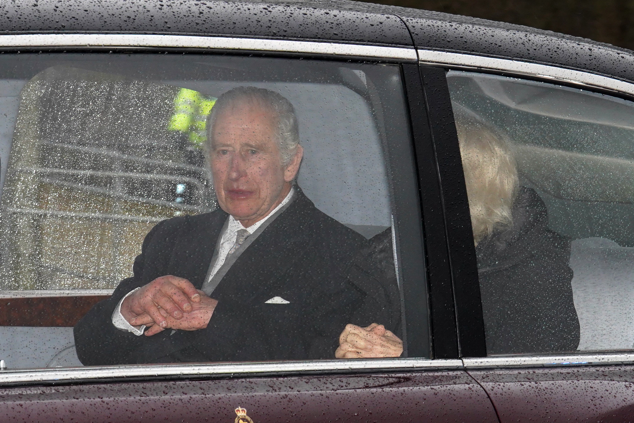 King Charles III and Queen Camilla photographed on February 13, 2024 as they arrive back at Clarence House in London after spending a week at Sandringham in Norfolk | Source: Getty Images