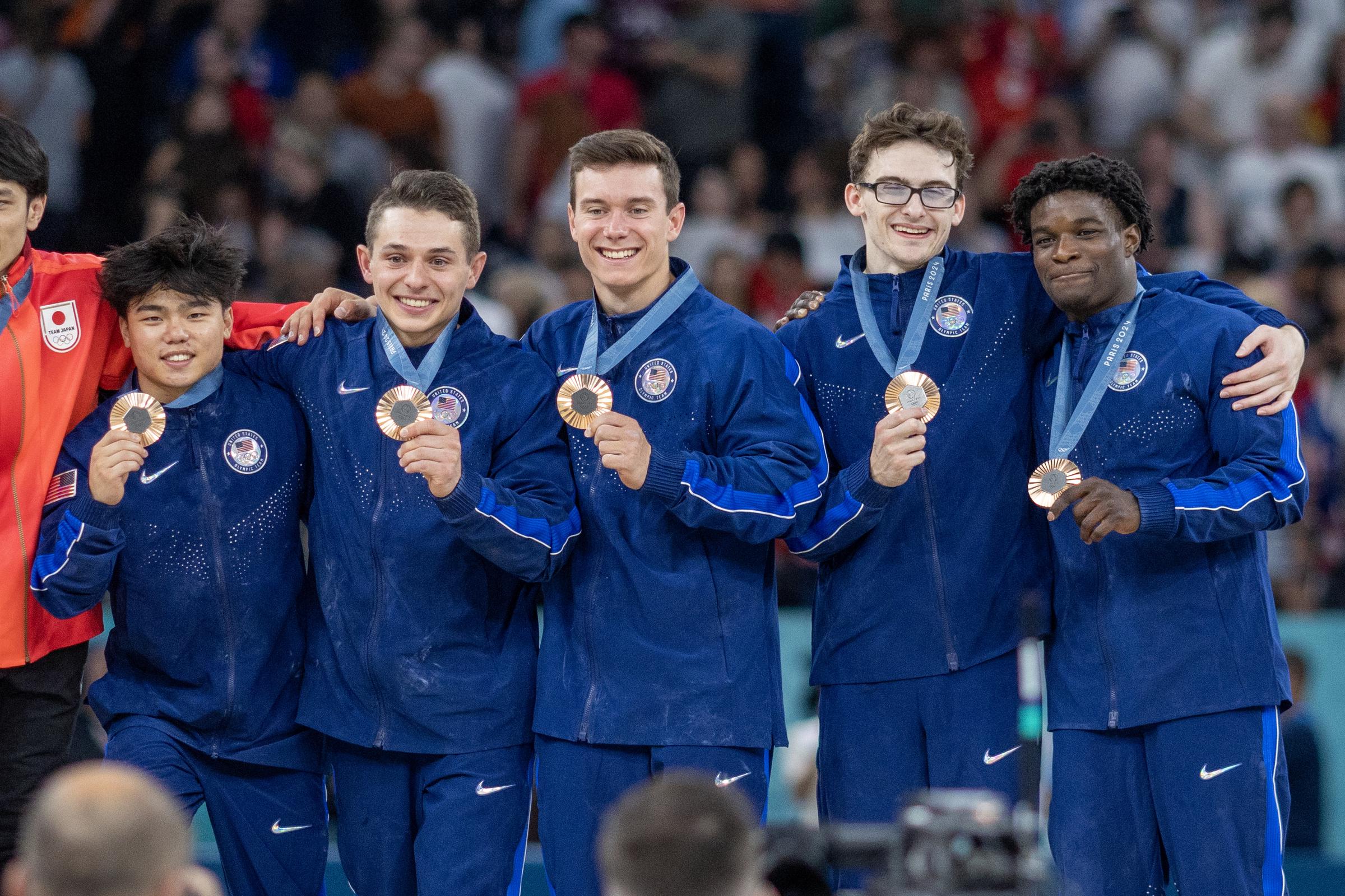 USA team of Asher Hong, Paul Juda, Brody Malone, Stephen Nedoroscik and Frederick Richard on the podium with their bronze medals during the Artistic Gymnastics Men's Team Final at the Bercy Arena during the Paris 2024 Summer Olympic Games on July 29th, 2024 in Paris, France | Source: Getty Images