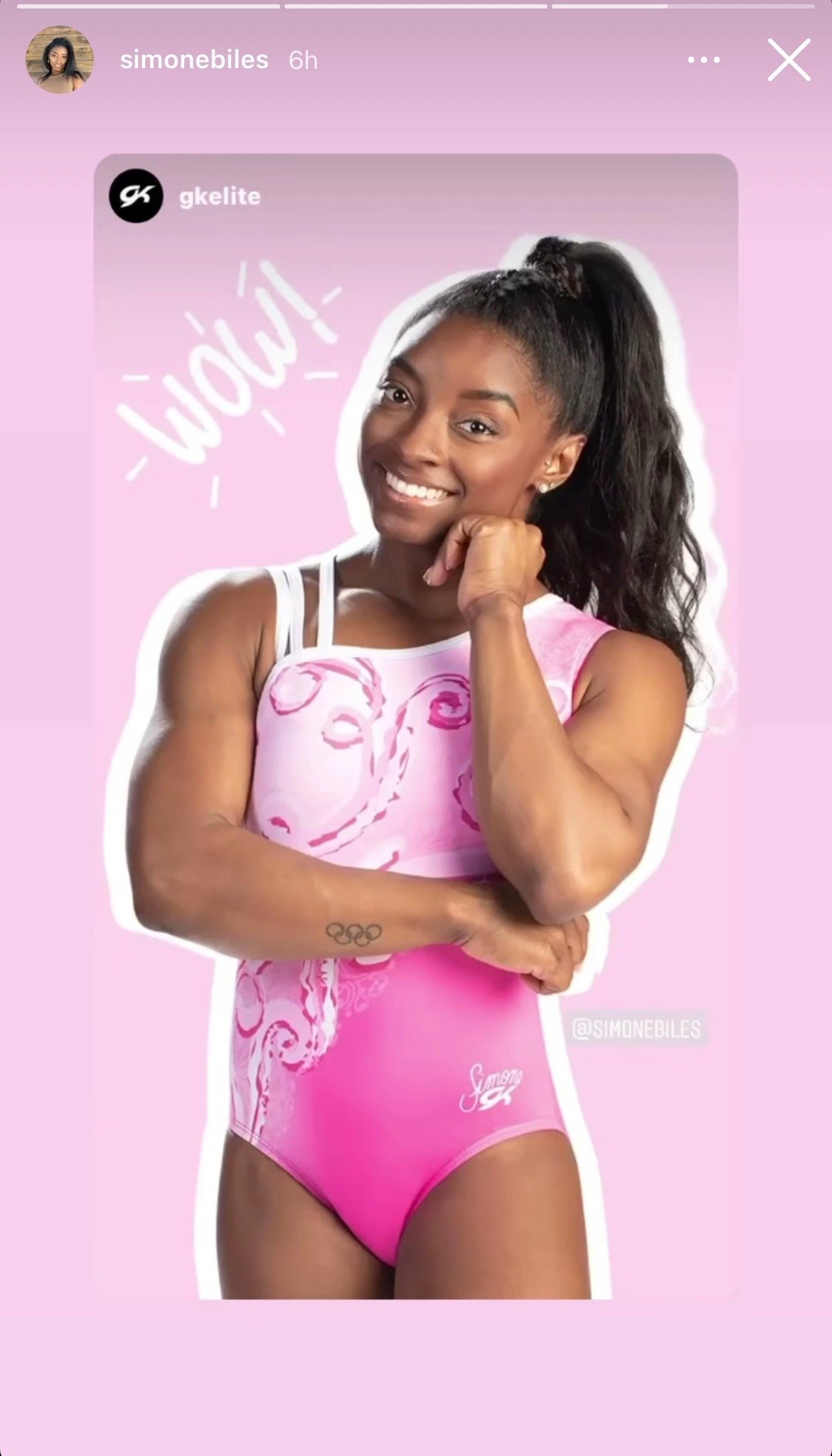 Simone Biles wearing a pink gymnast apparel from GK Elite, showing her toned body. | Photo: instagram.com/simonebiles