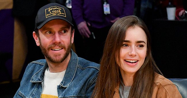 Lily Collins and her husband Charlie McDowell watches the basketball game between the Los Angeles Lakers and the Cleveland Cavaliers at Staples Center on January 13, 2020. | Photo: Getty Images