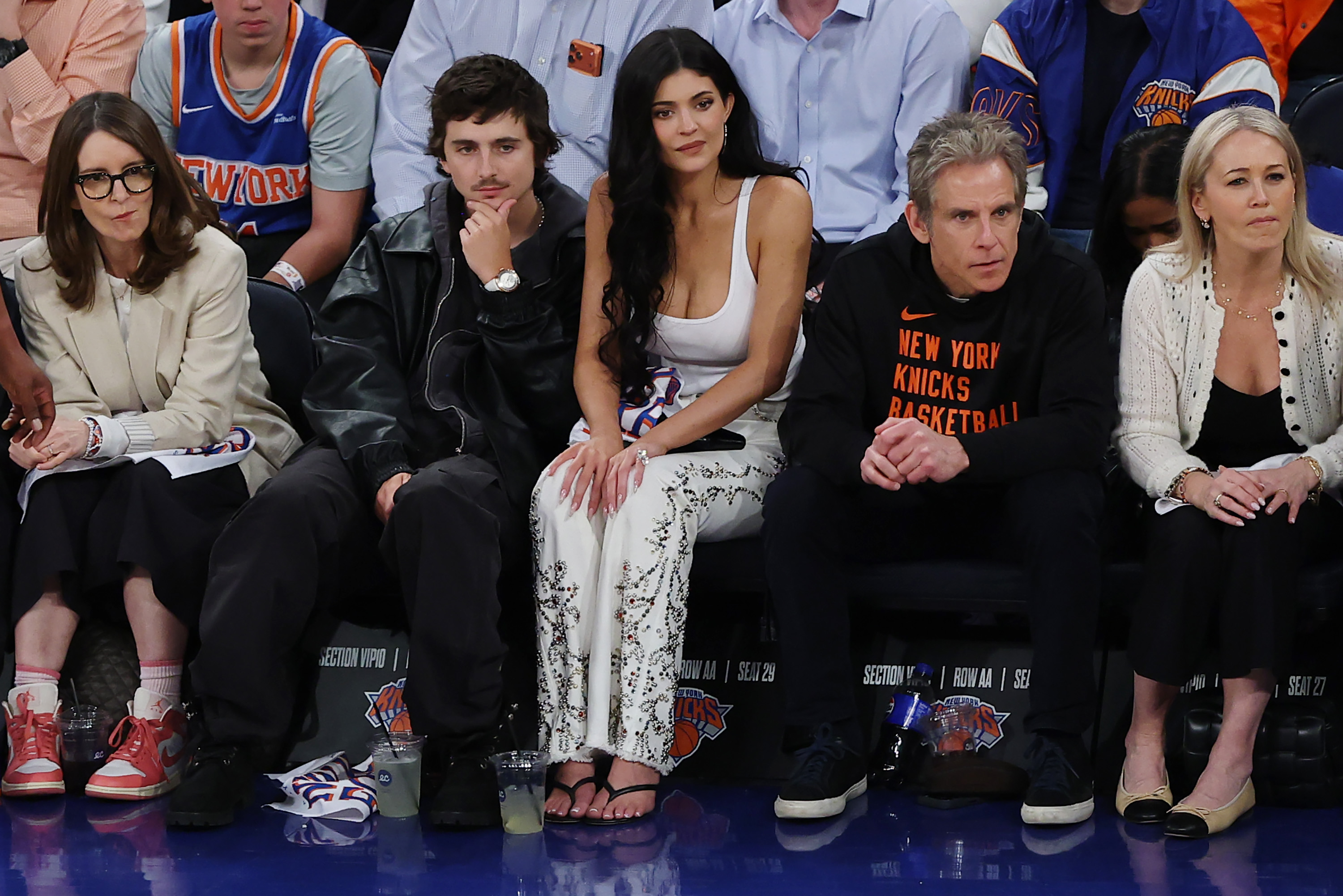 Tina Fey, Timothée Chalamet, Kylie Jenner, Ben Stiller, and Christine Taylor attend Game Five of the Eastern Conference First Round NBA Playoffs between the New York Knicks and the Atlanta Hawks at Madison Square Garden on April 28, 2026 in New York City. | Source: Getty Images