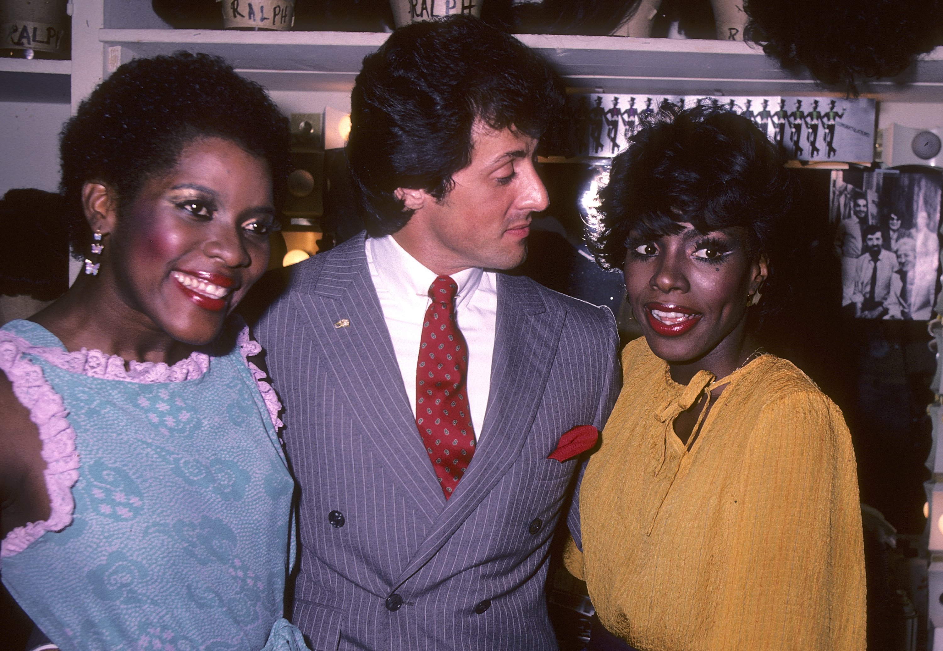 Loretta Devine, Sylvester Stallone and Sheryl Lee Ralph backstage after a performance of the Broadway musical "Dreamgirls" on September 14, 1982, at the Imperial Theatre, in New York City. | Source: Getty Images
