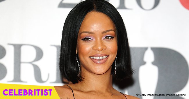 Rihanna flaunts deep cleavage in icy blue mini-dress in rare photo with ...