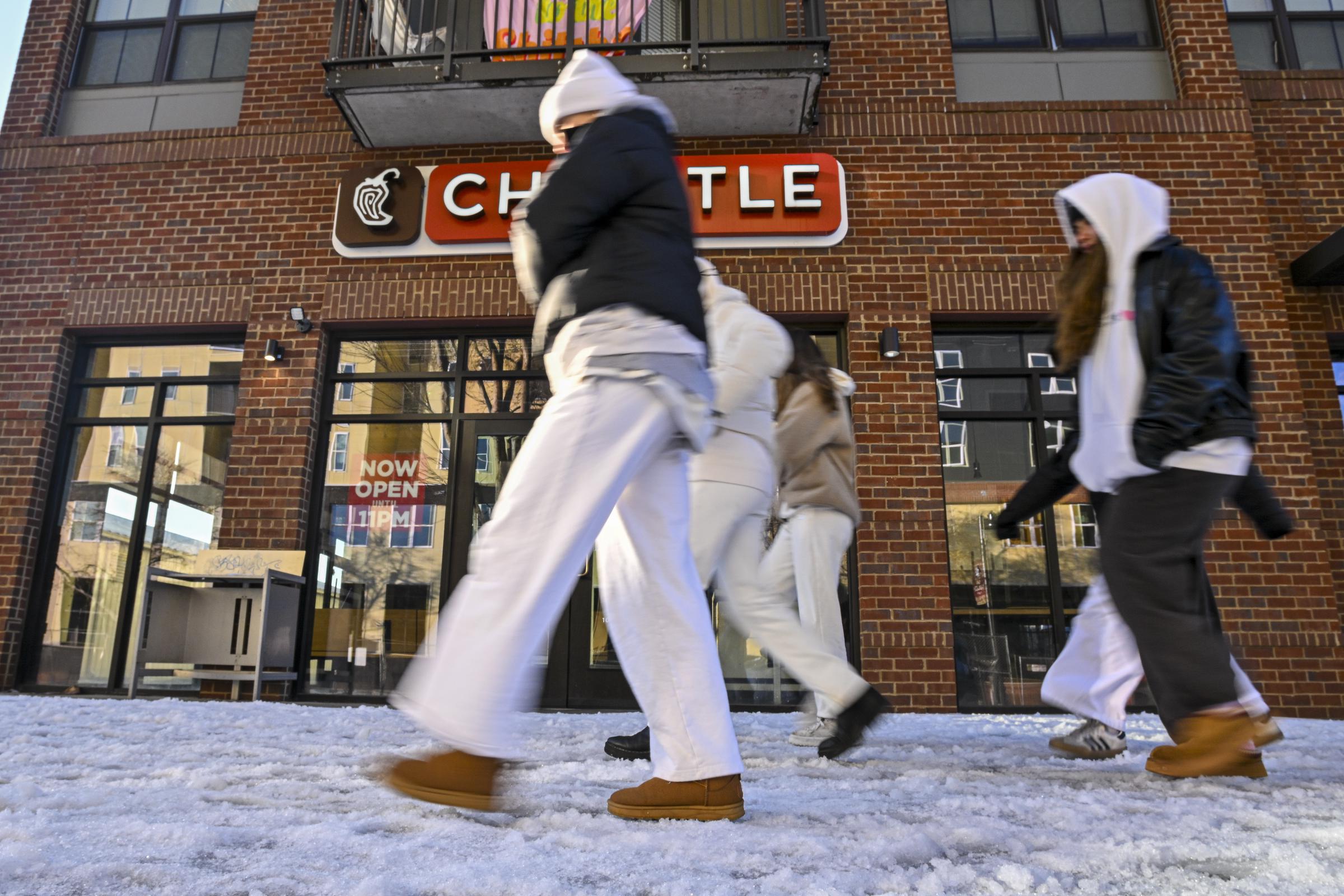 Civilians walking in the snow in Tallahassee, Florida on January 22, 2025. | Source: Getty Images