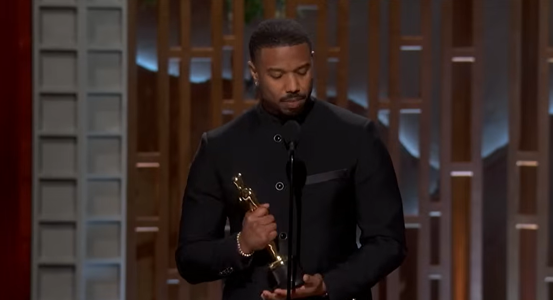 Michael B. Jordan holds his award as he prepares to leave the stage. | Source: YouTube/ABCNews