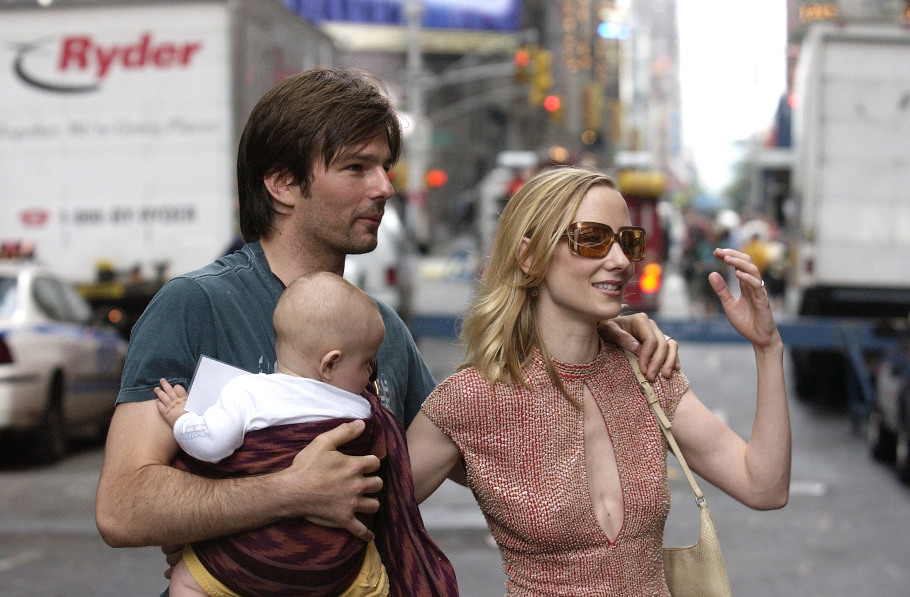 Anne Heche and Coley Laffoon with their child leaving "Broadway on Broadway"  in New York City | Source: Getty Images