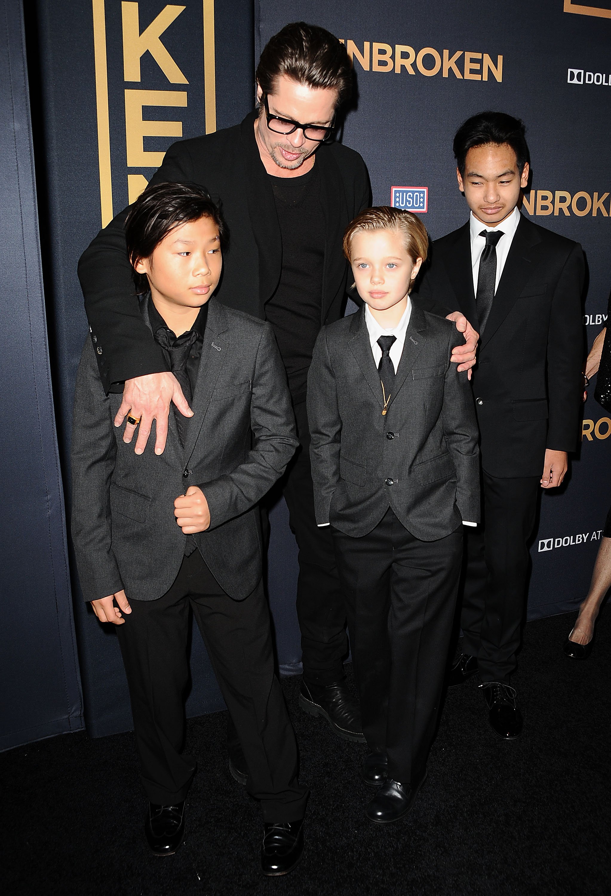 Actor Brad Pitt, Pax Thien Jolie-Pitt, Shiloh Nouvel Jolie-Pitt and Maddox Jolie-Pitt at the premiere of "Unbroken" at TCL Chinese Theatre IMAX on December 15, 2014 in Hollywood, California. | Source: Getty Images