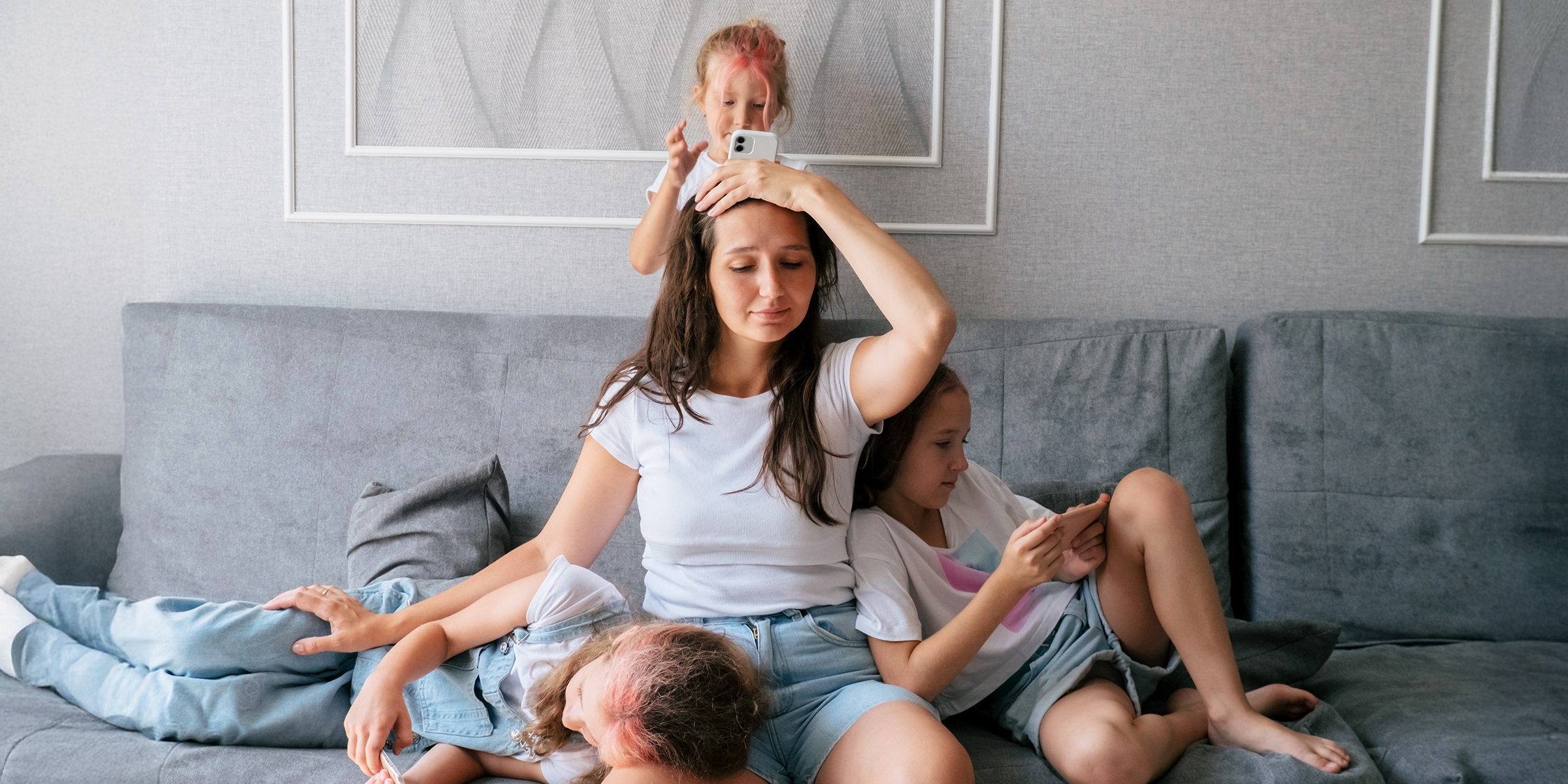 A mother with her three kids | Source: Shutterstock