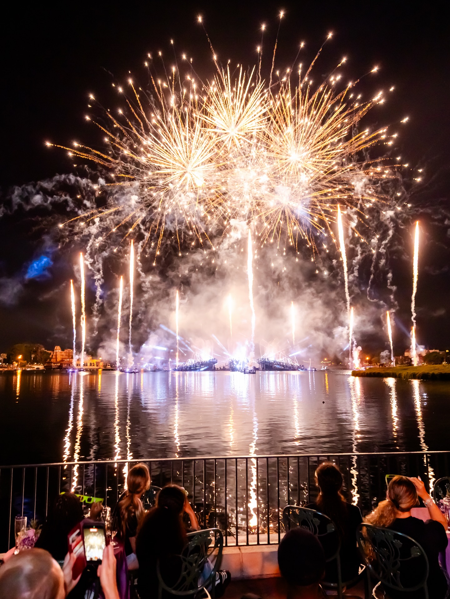 The final image showed fireworks lighting up the night sky over the water as guests watched below | Source: Facebook/mariahcarey