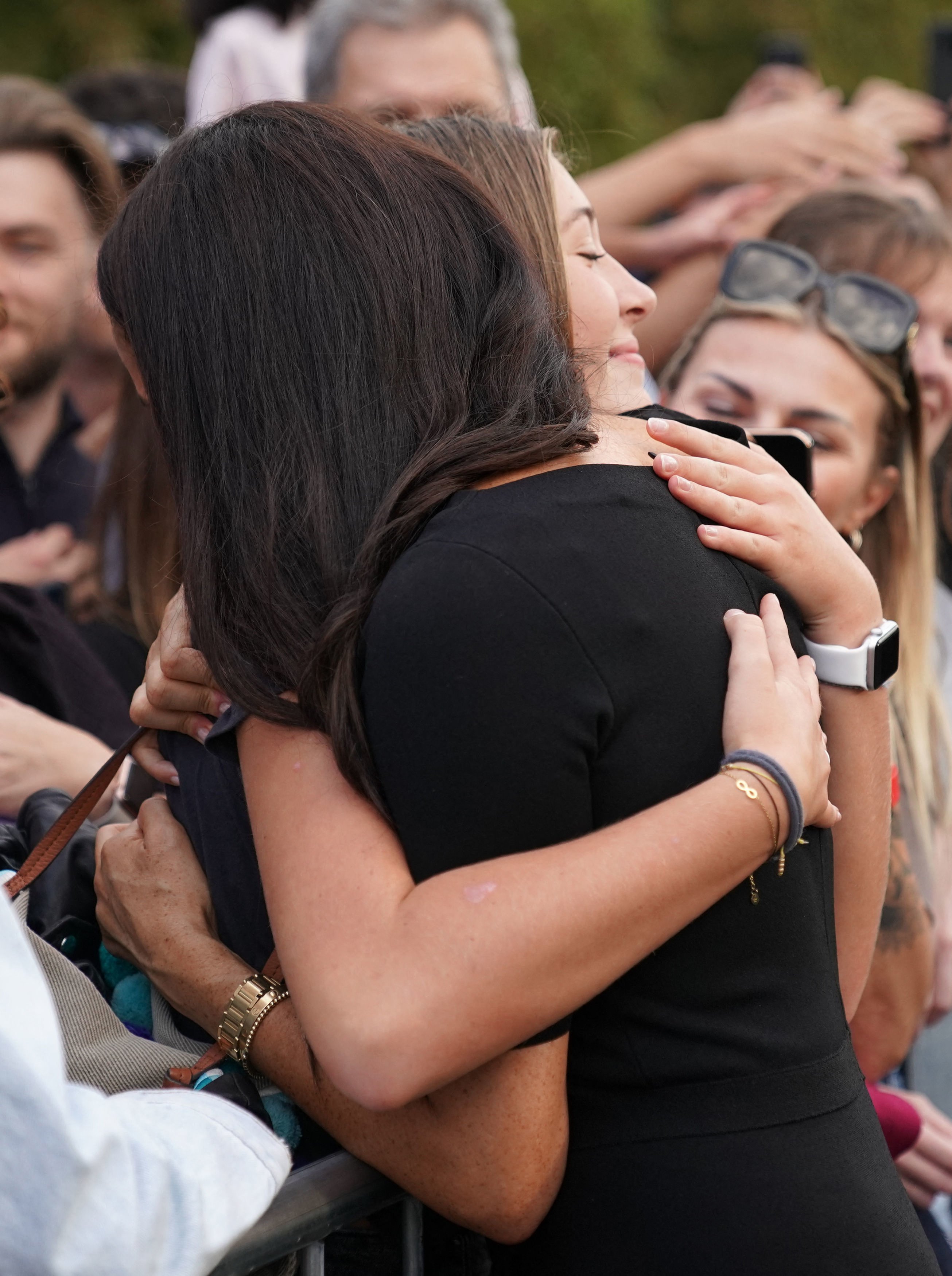 Duchess of Sussex receives a hug from a well wisher on the Long walk at Windsor Castle on September 10, 2022 | Source: Getty Images