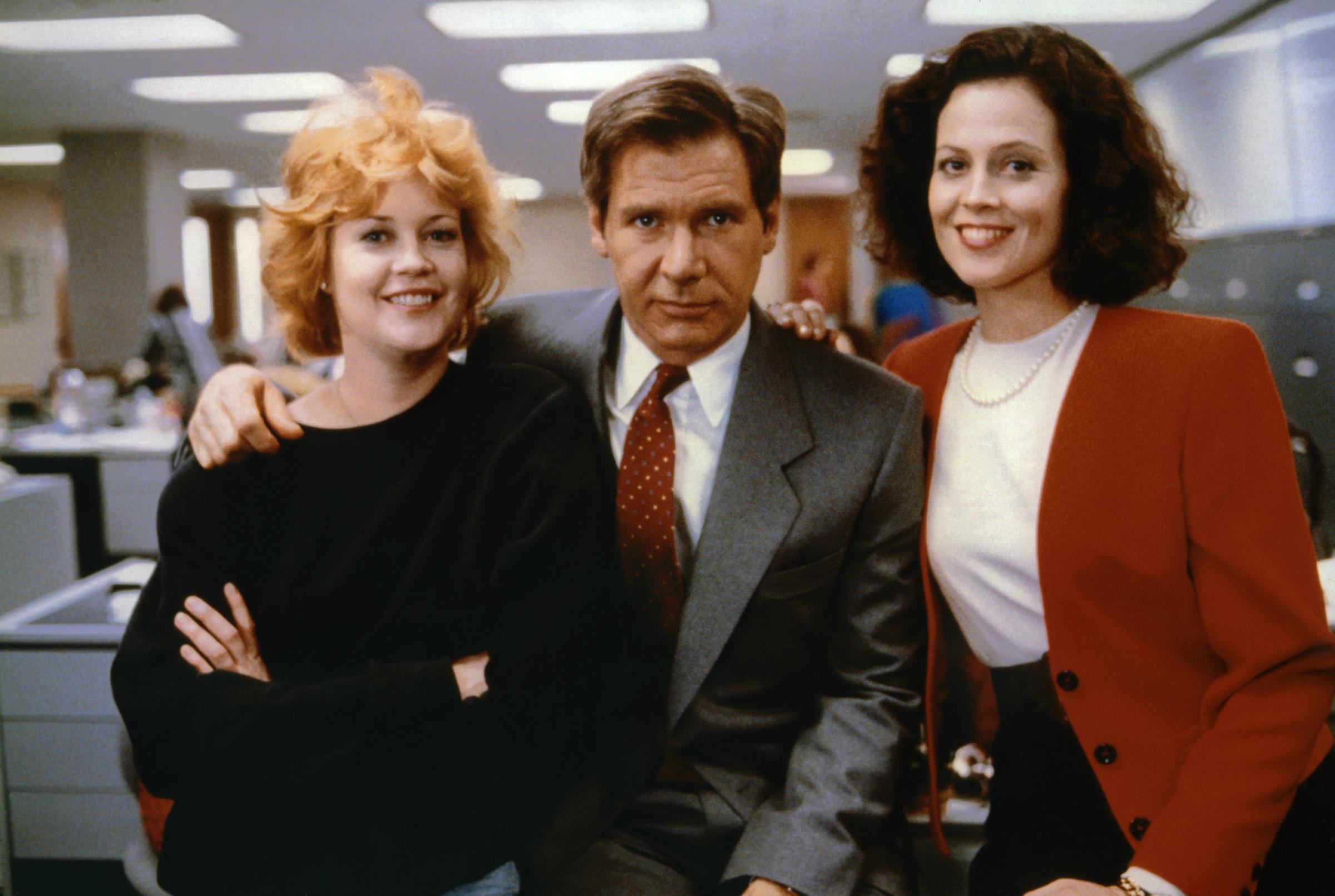 Melanie Griffith, Harrison Ford and Sigourney Weaver on the set of "Working Girl," 1988 | Source: Getty Images