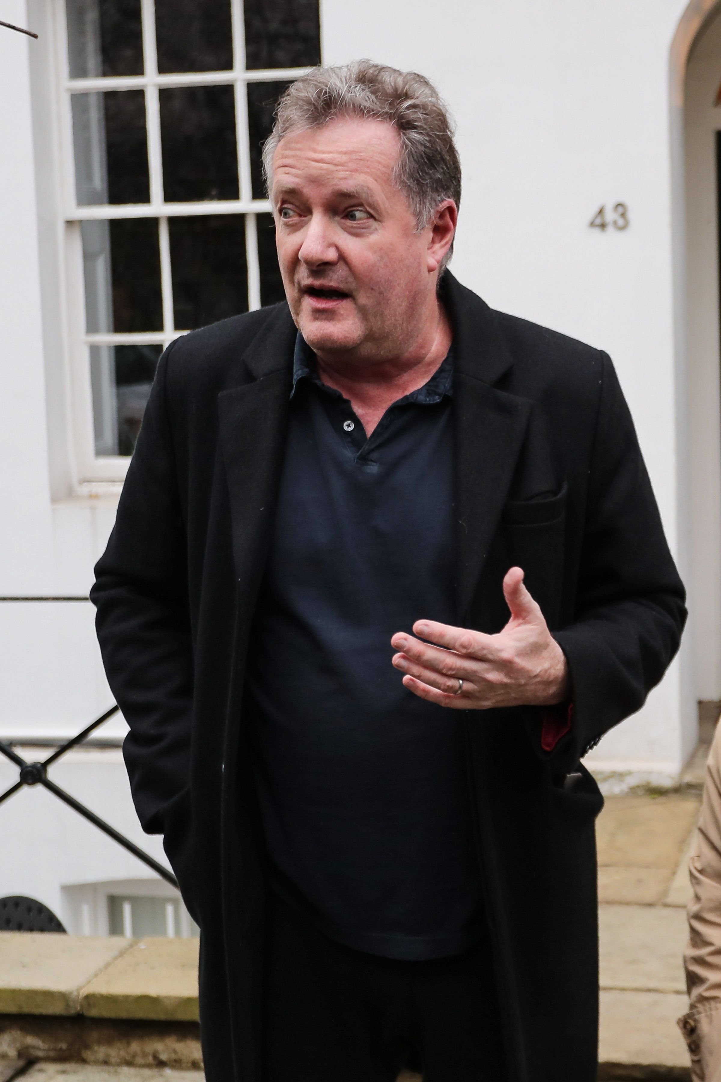 Piers Morgan seen leaving his West London home to take his daughter to school on March 10, 2021 | Getty Images