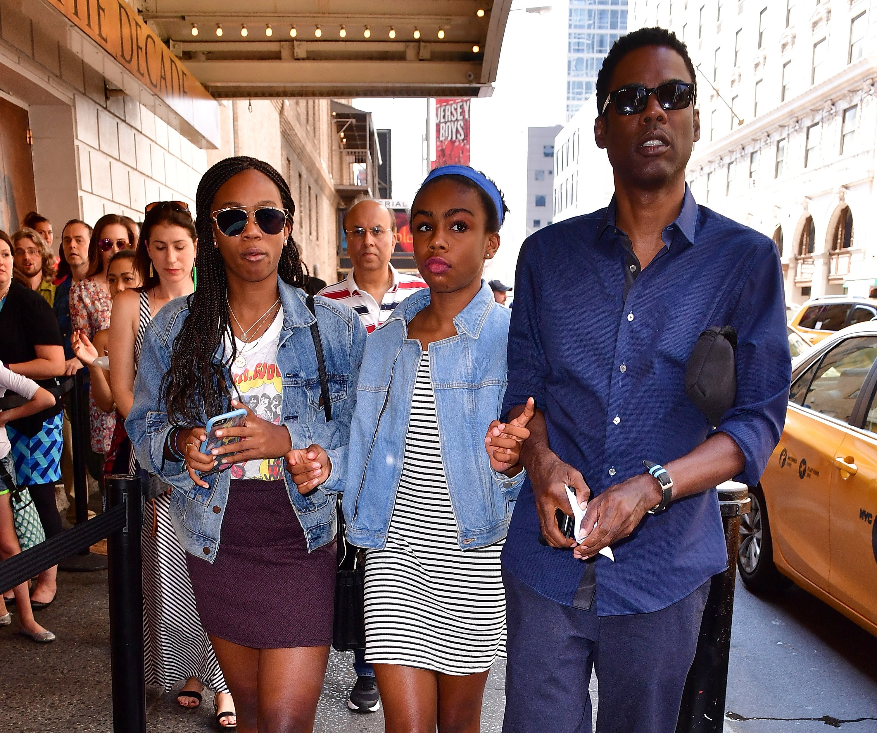 Chris Rock with his daughters Zahra Savannah Rock and Lola Simone Rock on June 19, 2016 | Source: Getty Images
