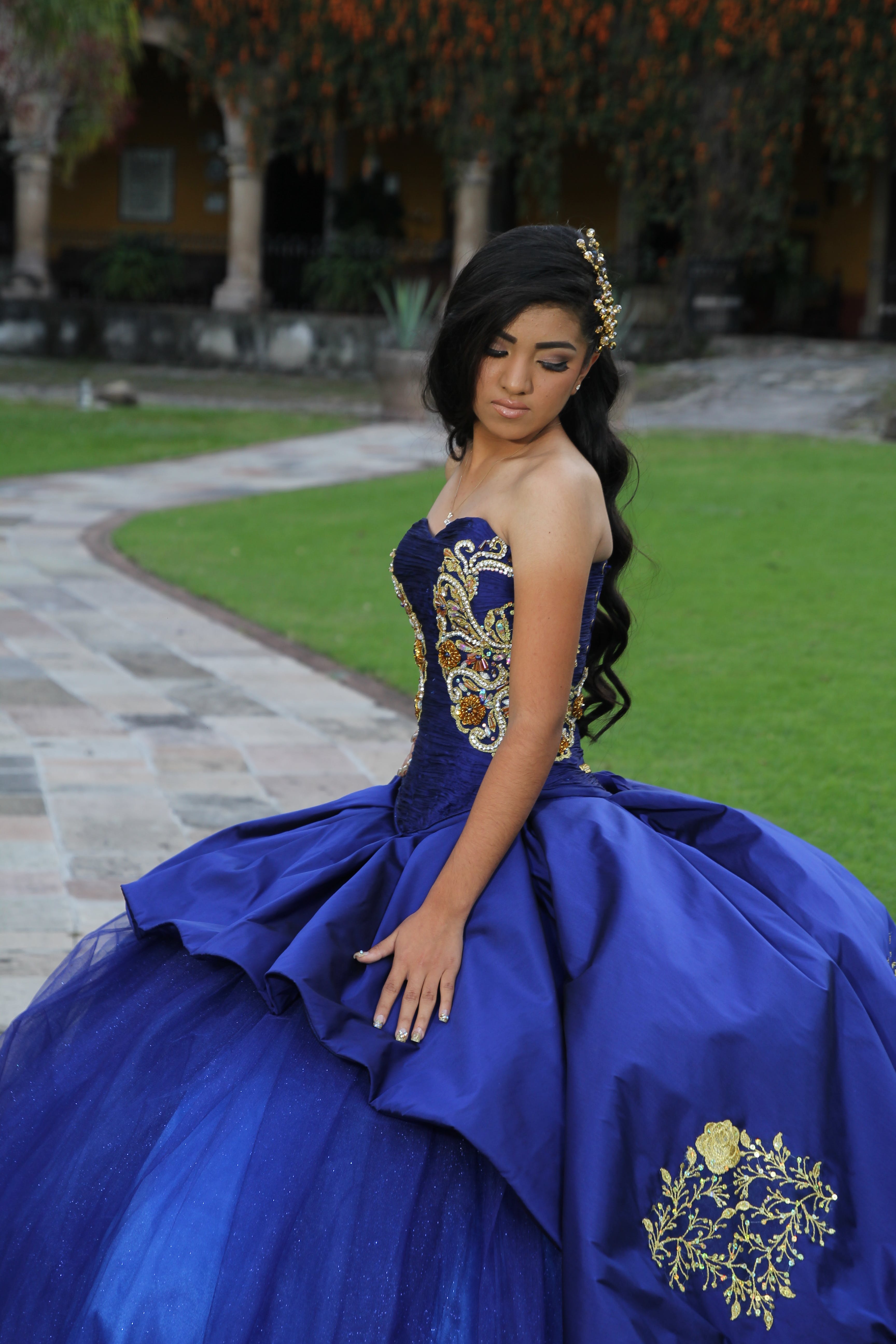 A young woman in a Quinceanera gown | Source: Pexels