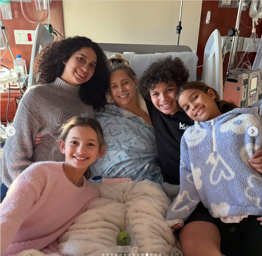 Criscilla Anderson lays on her hospital bed as her children surround her, as seen from a post dated December 3, 2025. | Source: Insgtagram/criscilla