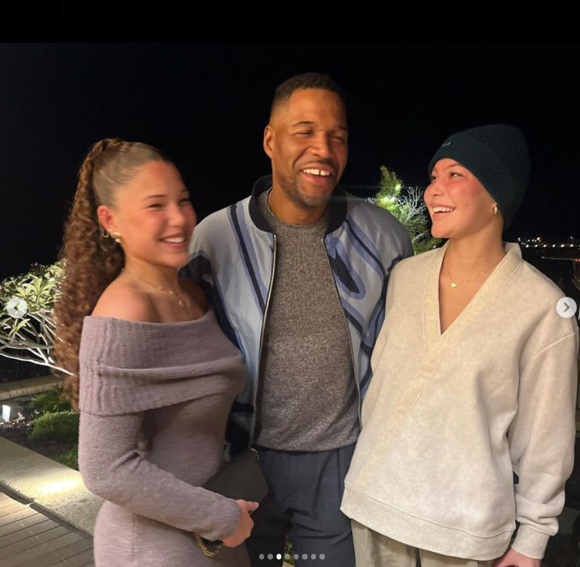 Michael Strahan smiles with his twin daughters Sophia and Isabella Strahan, January 2024. | Source: Instagramsophialstrahan