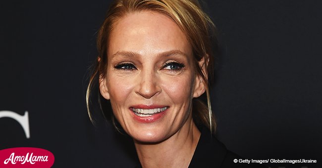 Uma Thurman rocks a mini black dress, revealing how youthful she looks at the age of 47