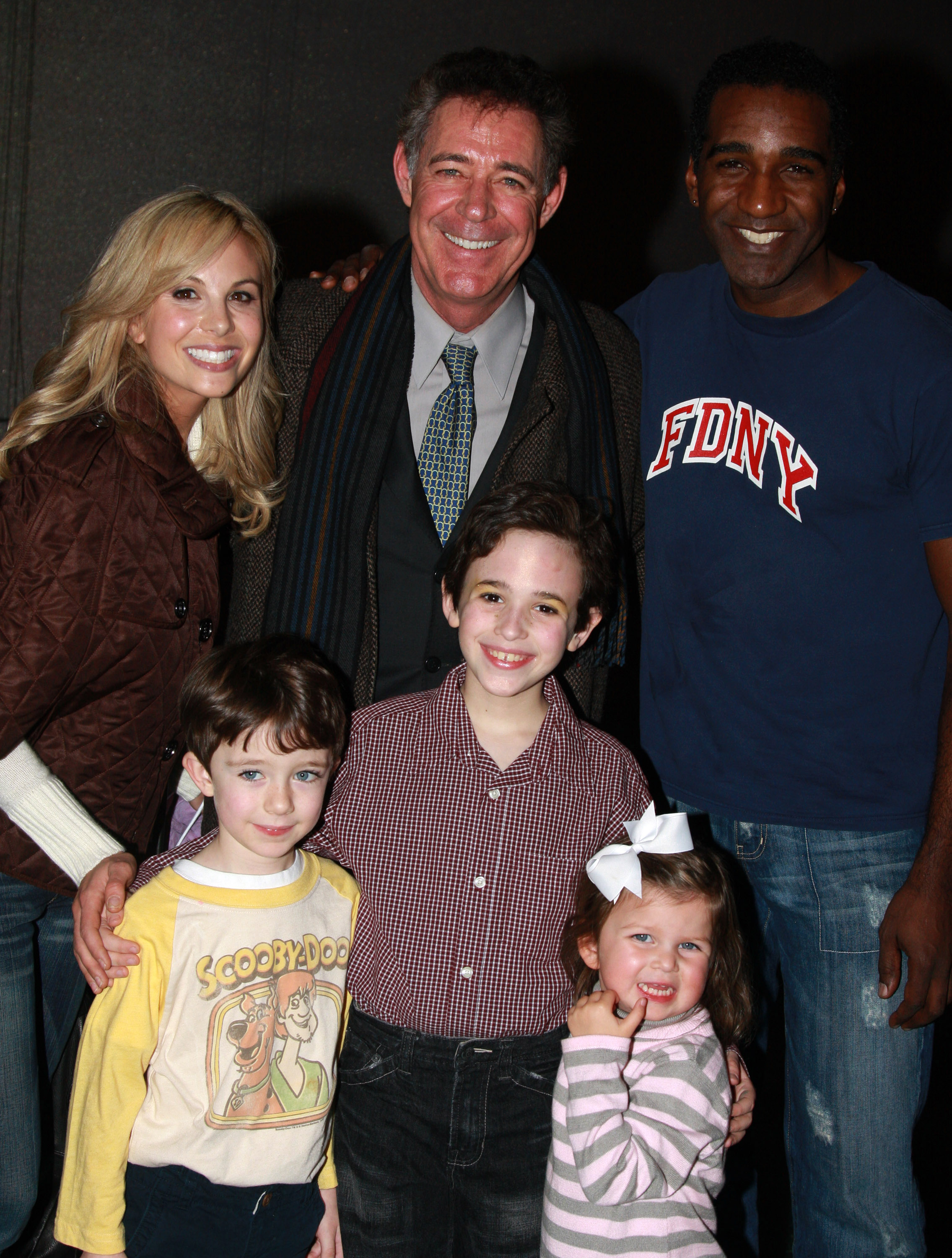 (L-R) Elizabeth Hasselback, Barry Williams, Norm Lewis, Trevor Braun,  Brandon Eric Williams, and Grace Hasselback pose as they visit backstage at "The Little Mermaid" on Broadway at The Lunt Fontanne Theater on January 16, 2008, in New York City. | Source: Getty Images