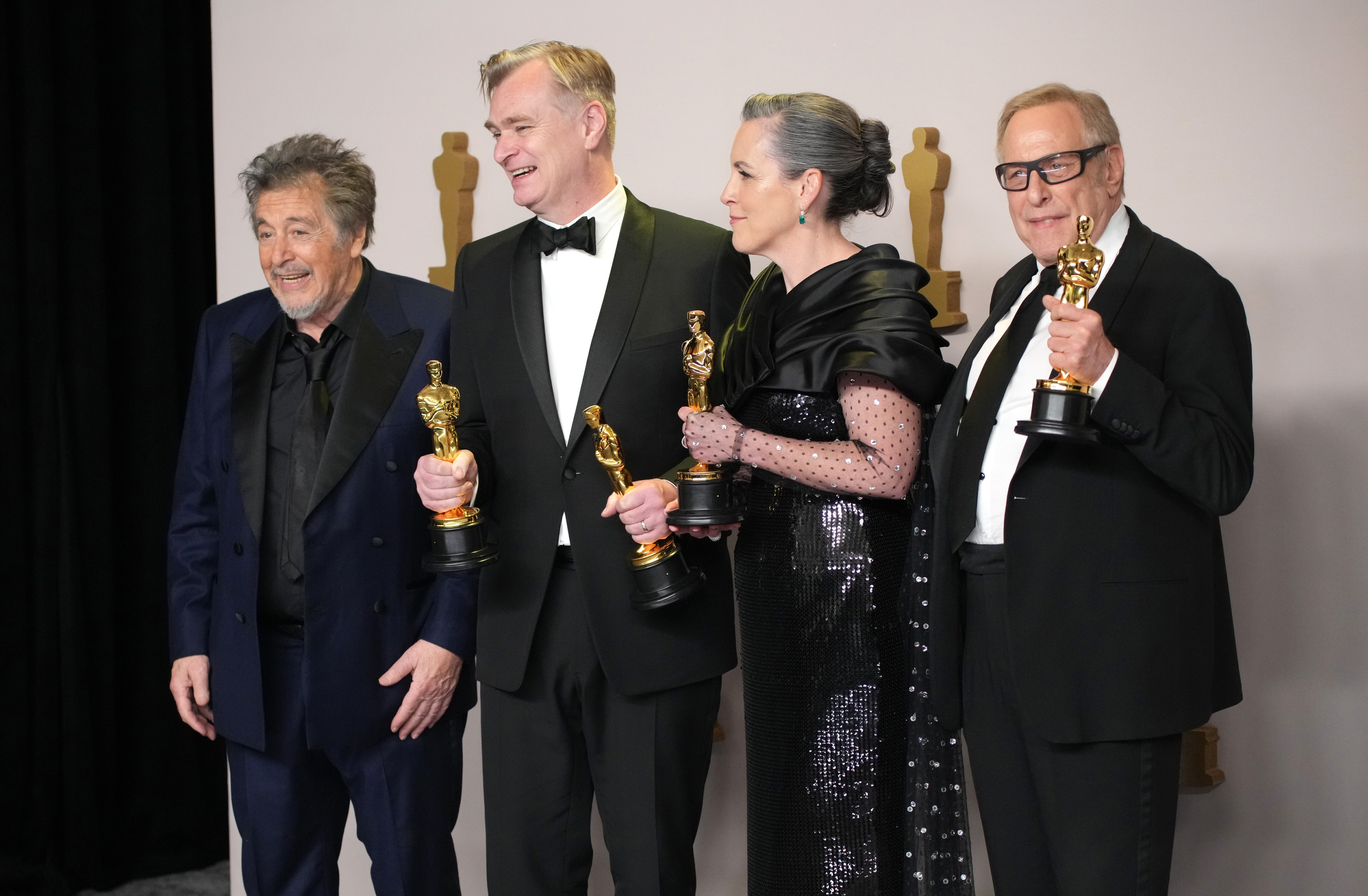 Christopher Nolan, Emma Thomas, and Charles Roven, winners of the Best Picture award for “Oppenheimer,” pose with Al Pacino at the 96th Annual Academy Awards on March 10, 2024 in Hollywood, California | Source:  Getty Images