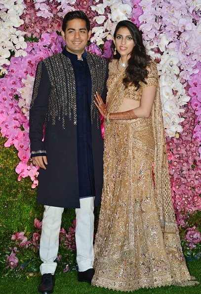 Akash Ambani and Shloka Mehta at their wedding party, in Mumbai | Photo: Getty Images