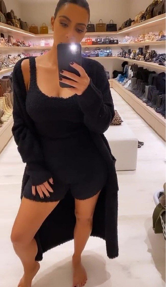 Kim Kardashian taking a selfie in her closet | Photo: Instagram/KimKardashianWest