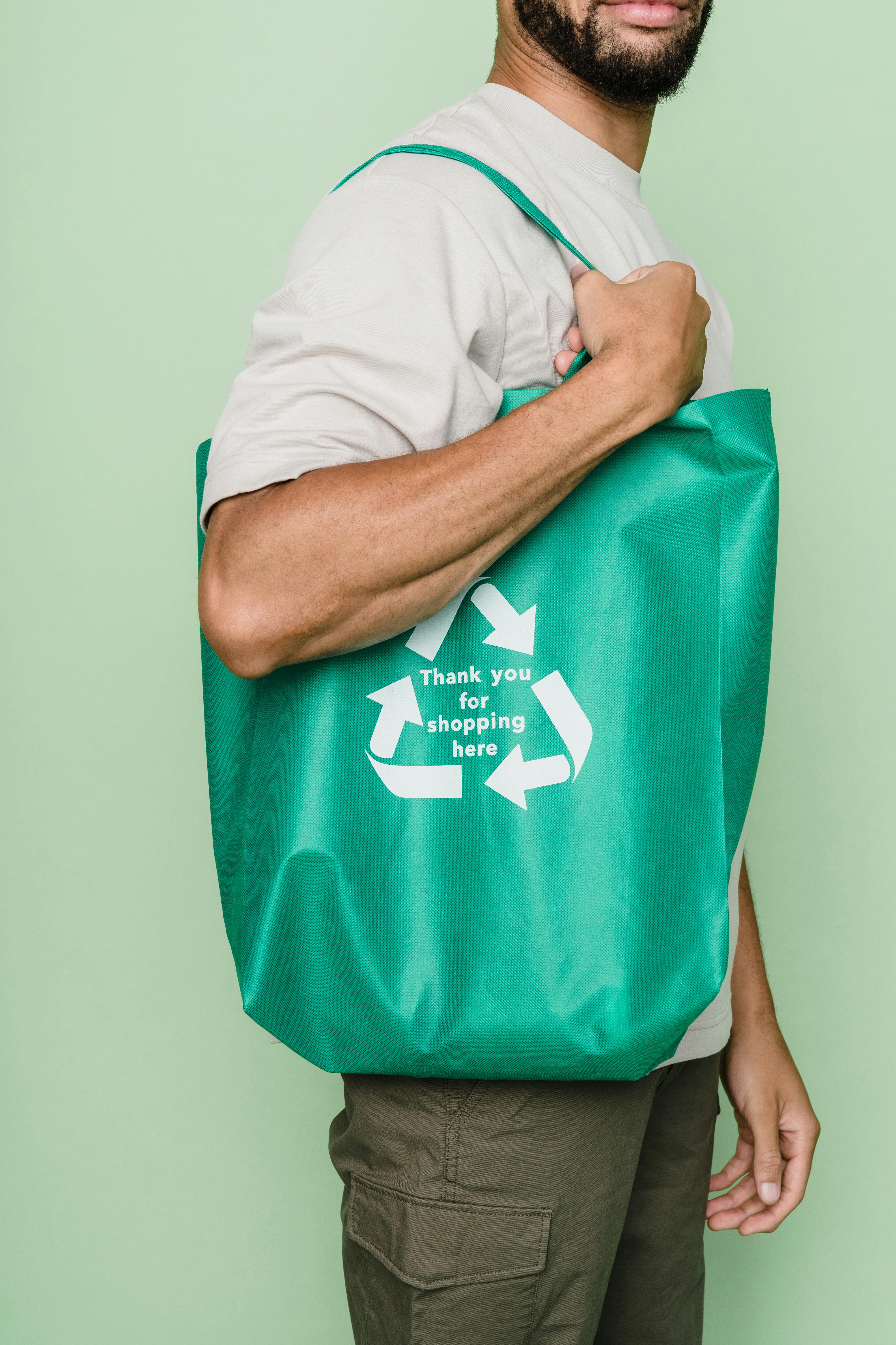 A man carrying an eco-bag | Source: Pexels