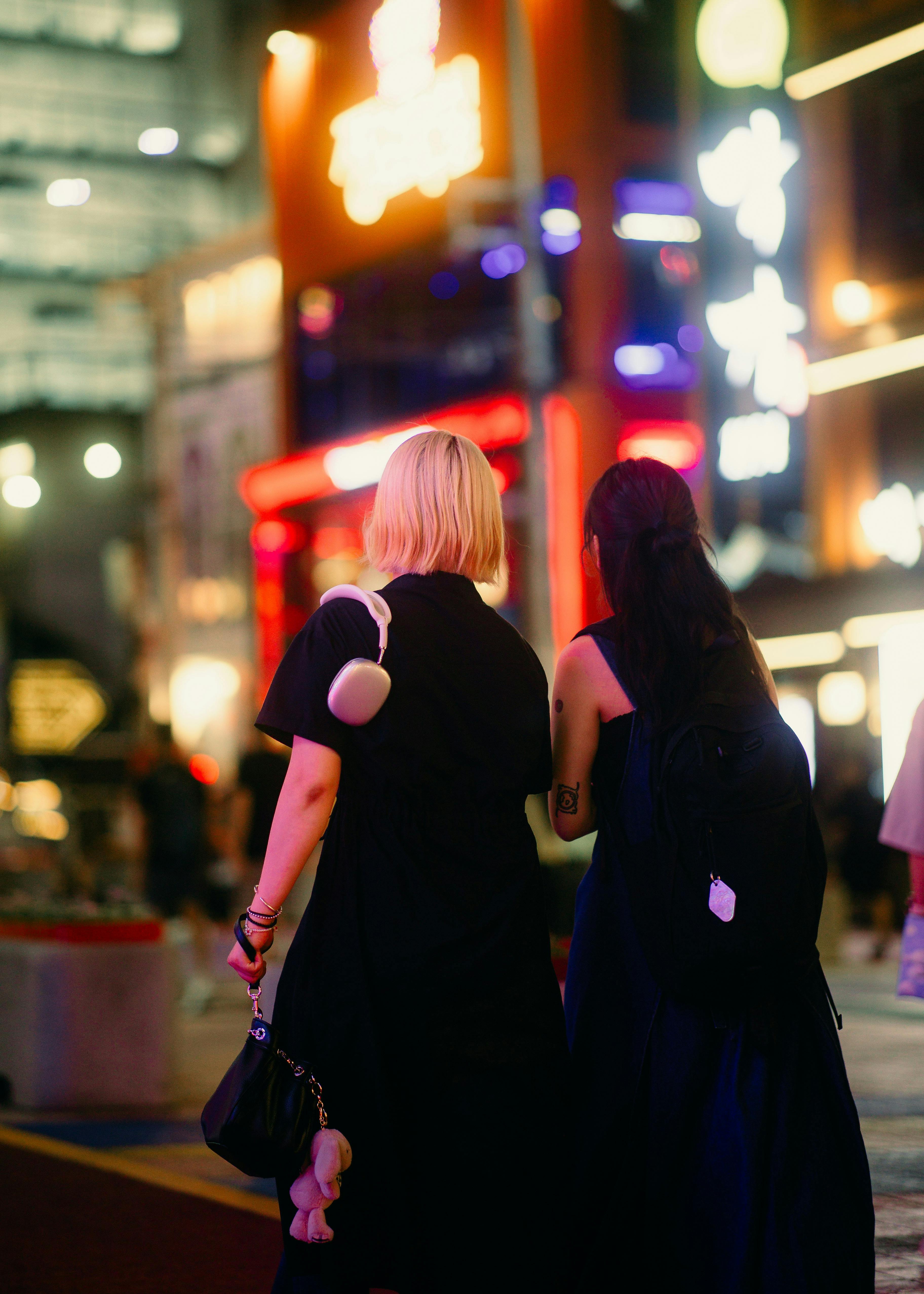 Two women walking in the street | Source: Pexels