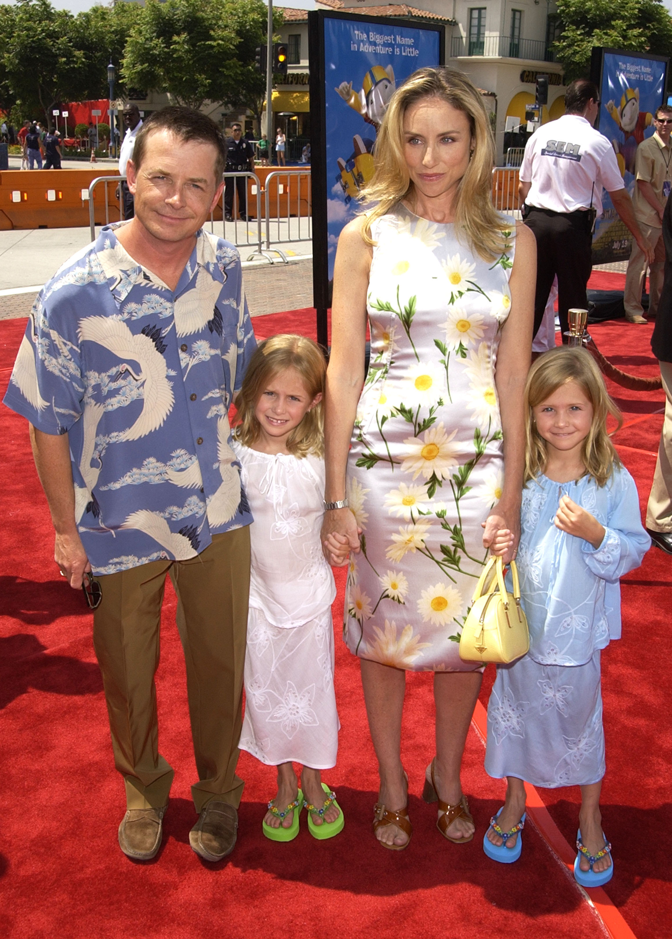 Michael J. Fox, his wife Trace, and their twin daughters Aquinnah and Schuyler on July 14, 2002 | Source: Getty Images