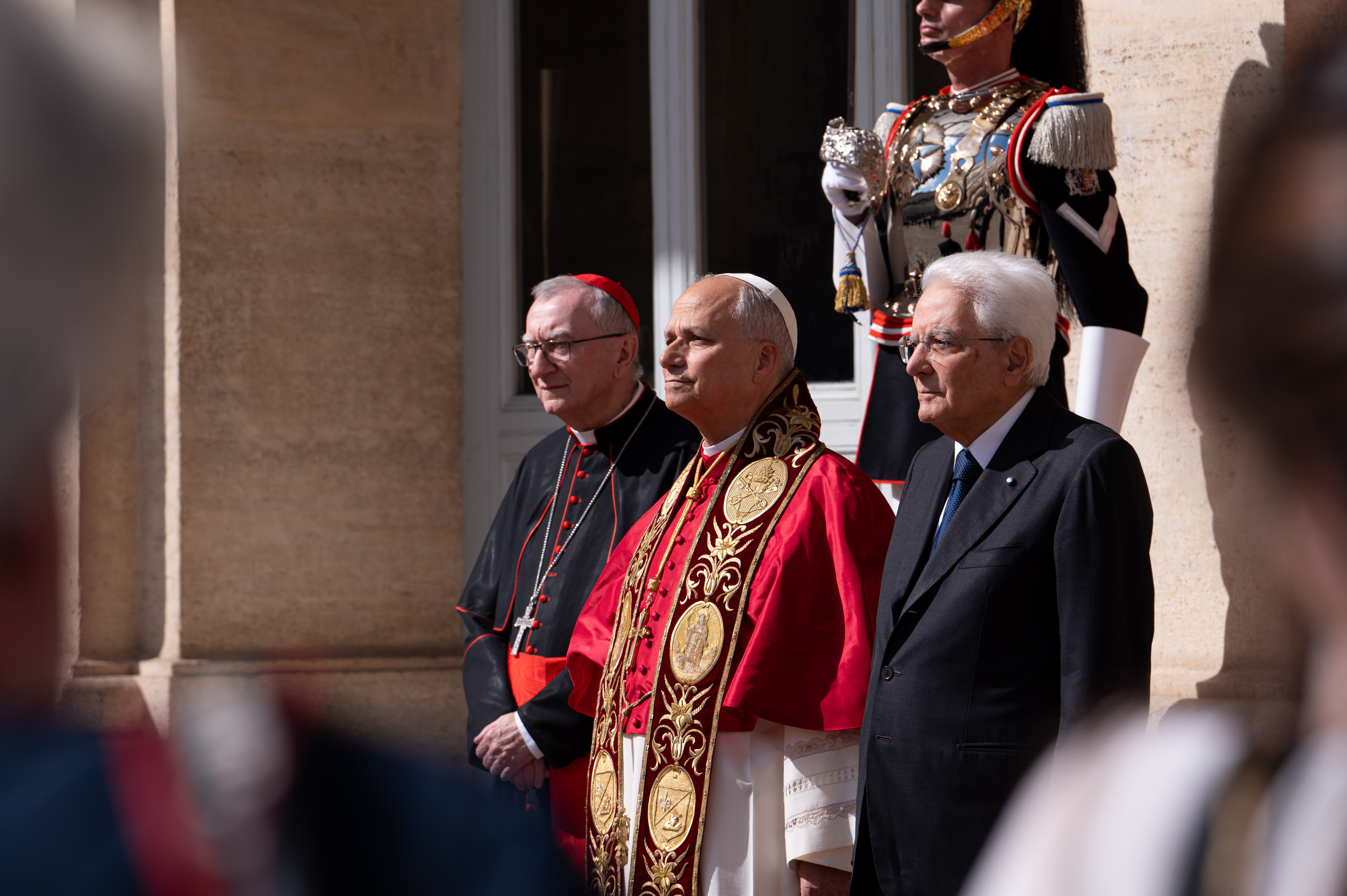 Pope Leo XIV stands with Italy's President Sergio Mattarella and Vatican Secretary of State Cardinal Pietro Parolin at the Quirinale Palace in Rome on October 14, 2025 | Source: Getty Images