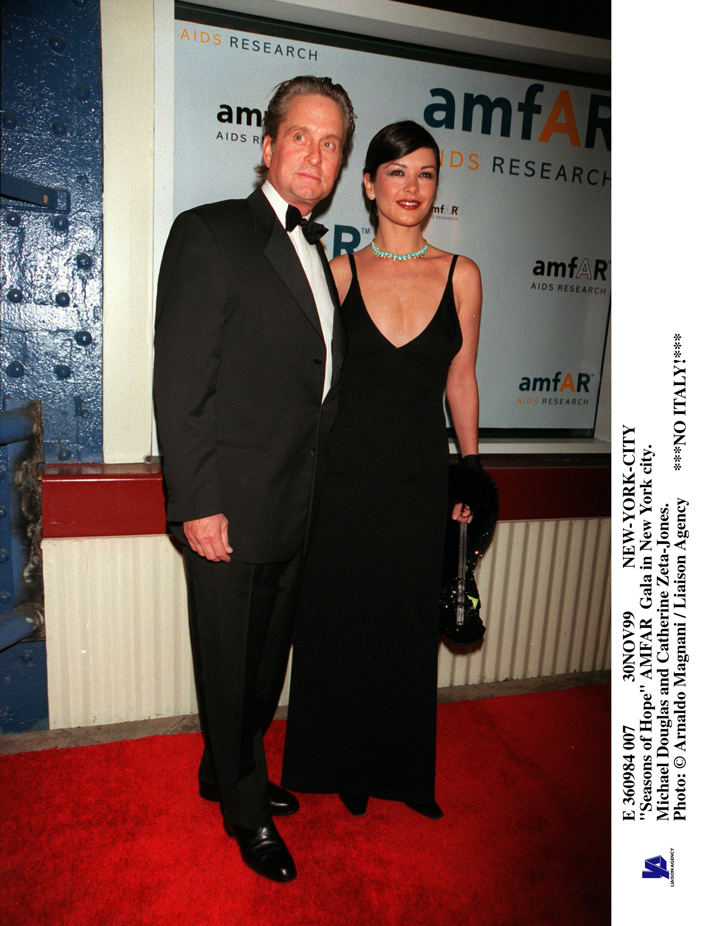Michael Douglas And Catherine Zeta-Jones at the Amfar Gala In New York City in 1999 | Source: Getty Images