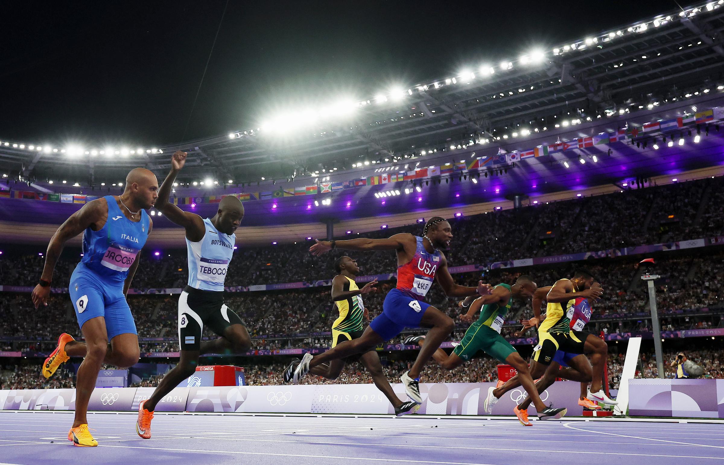 Noah Lyles crossing the finish line of the Men's 100-meter Final of the Olympic Games Paris 2024 on August 4, in France. | Source: Getty Images