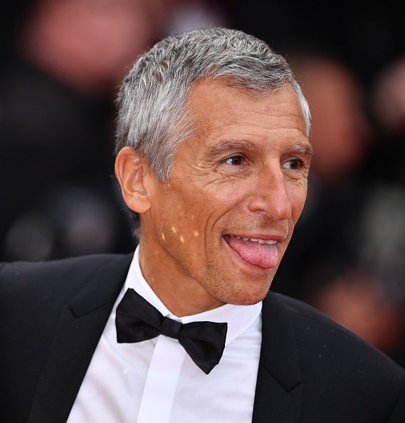Nagui arrive pour la projection du film "Les Plus Belles Annees d'une Vie". |Photo : Getty Images Nagui arrive pour la projection du film "Les Plus Belles Annees d'une Vie". |Photo : Getty Images