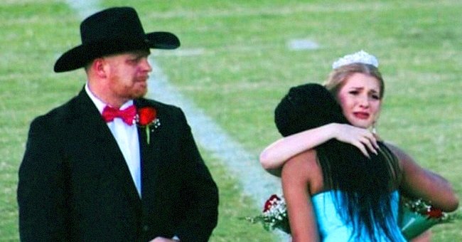 A homecoming queen prompts an emotional reaction as she hands her crown to another student who just lost her mother to cancer | Photo: Facebook/RickKarle 