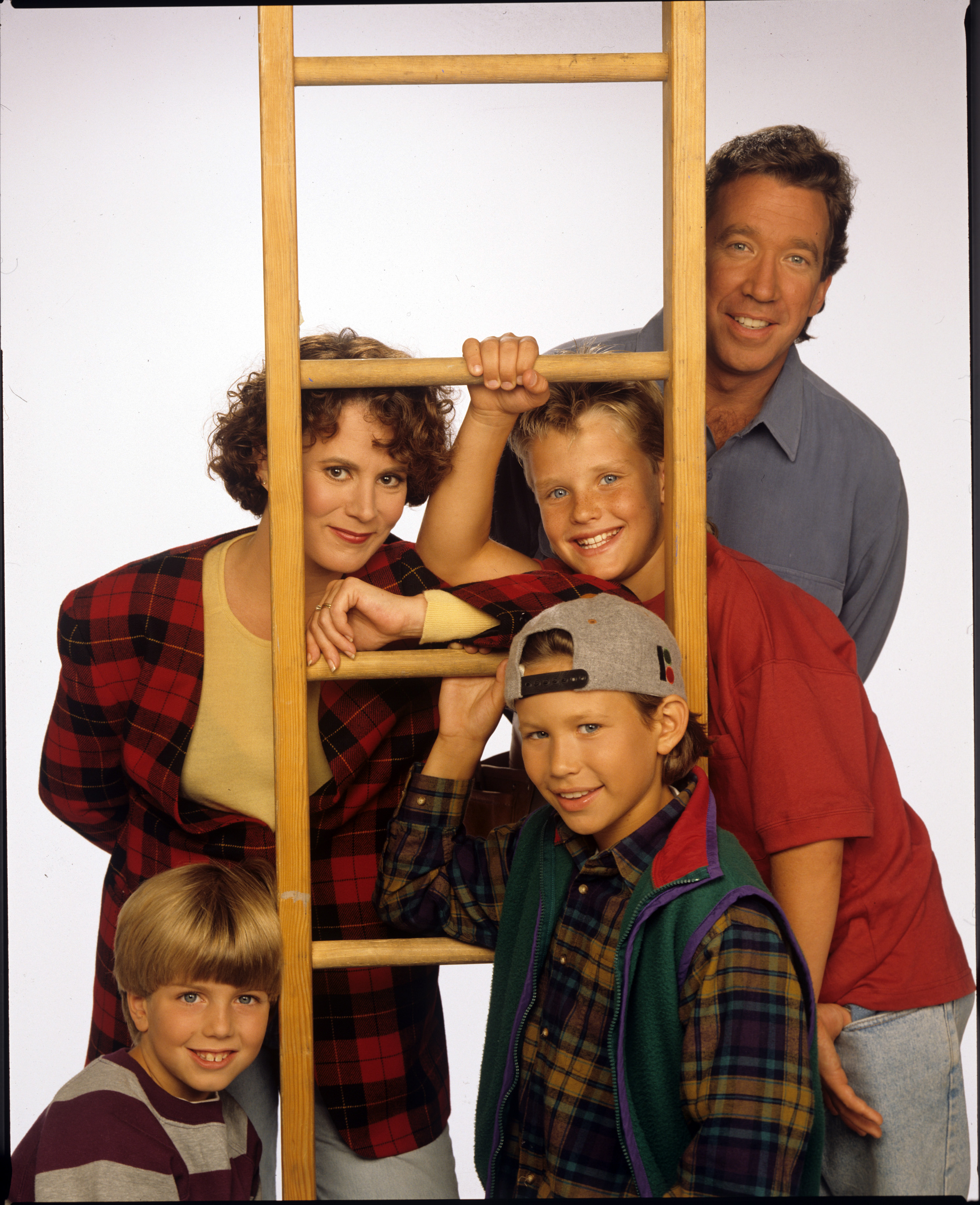 Patricia Richardson and Tim Allen with Taran Noah Smith, Jonathan Taylor Thomas, and Zachery Ty Bryan from "Home Improvement." | Source: Getty Images