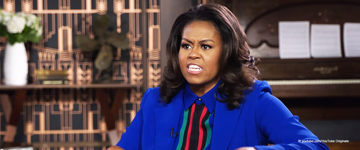 Michelle Obama sieht im gestreiften Hosenanzug klasse aus, als sie über Ehe mit Barack spricht
