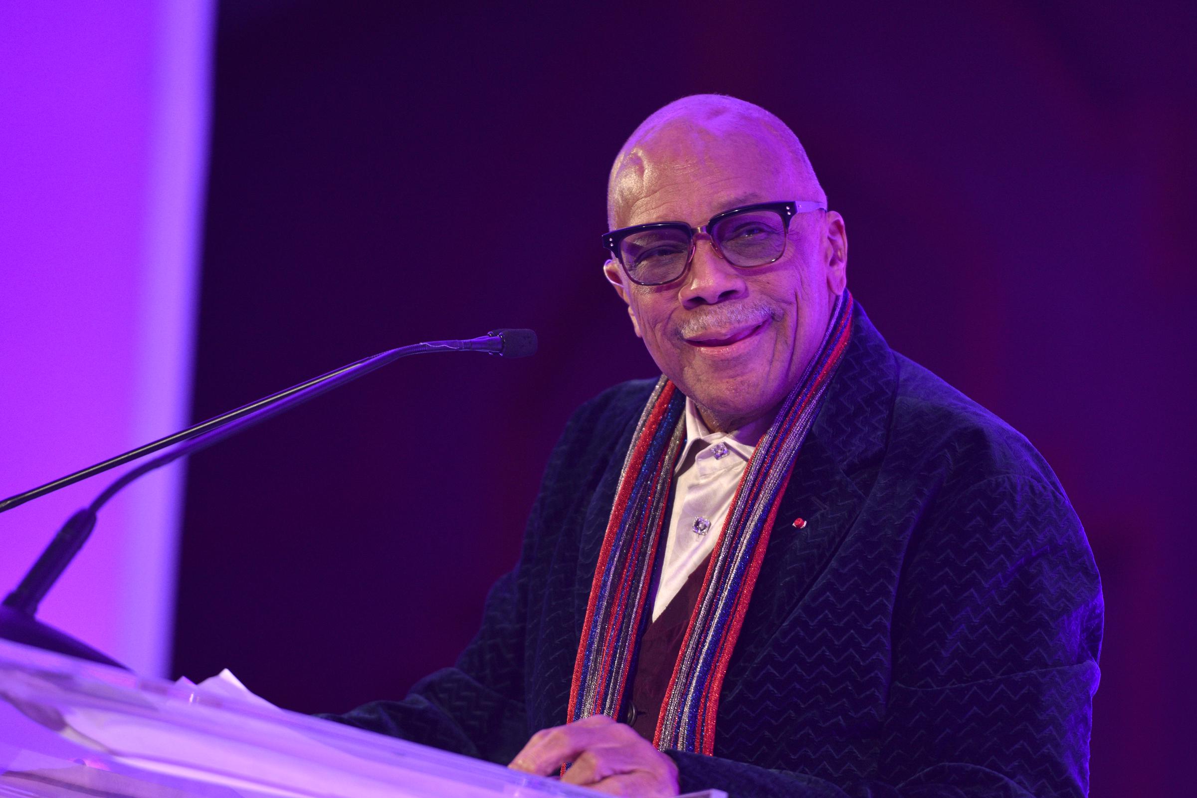 Quincy Jones presenting Amanda Booth the Global's Quincy Jones Exceptional Advocacy Award at the Global Down Syndrome Foundation's Be Beautiful Be Yourself Fashion Show in Denver, Colorado, on November 2, 2019 | Source: Getty Images