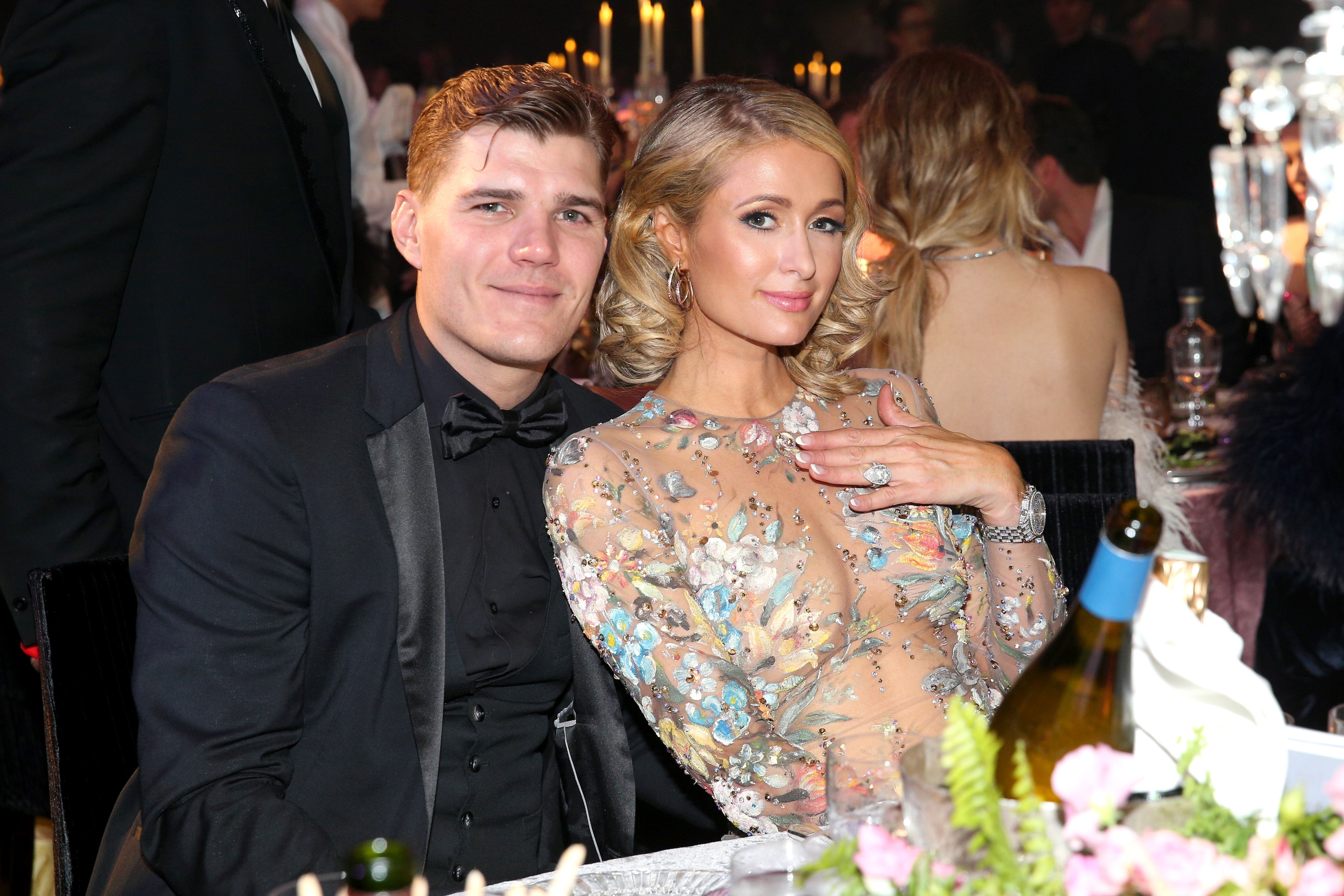  Chris Zylka and Paris Hilton attend the amfAR Gala Cannes 2018 dinner at Hotel du Cap-Eden-Roc on May 17, 2018 in Cap d'Antibes, France | Source: Getty Images