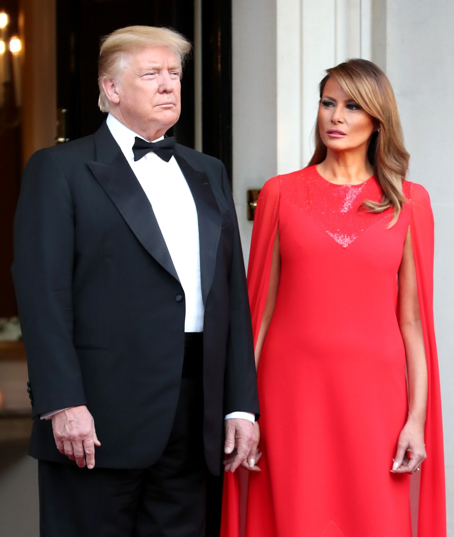 President Donald Trump and First Lady Melania Trump pose ahead of a dinner at Winfield House for Prince Charles, Prince of Wales and Camilla, Duchess of Cornwall, during their state visit on June 04, 2019 | Photo: Getty Images