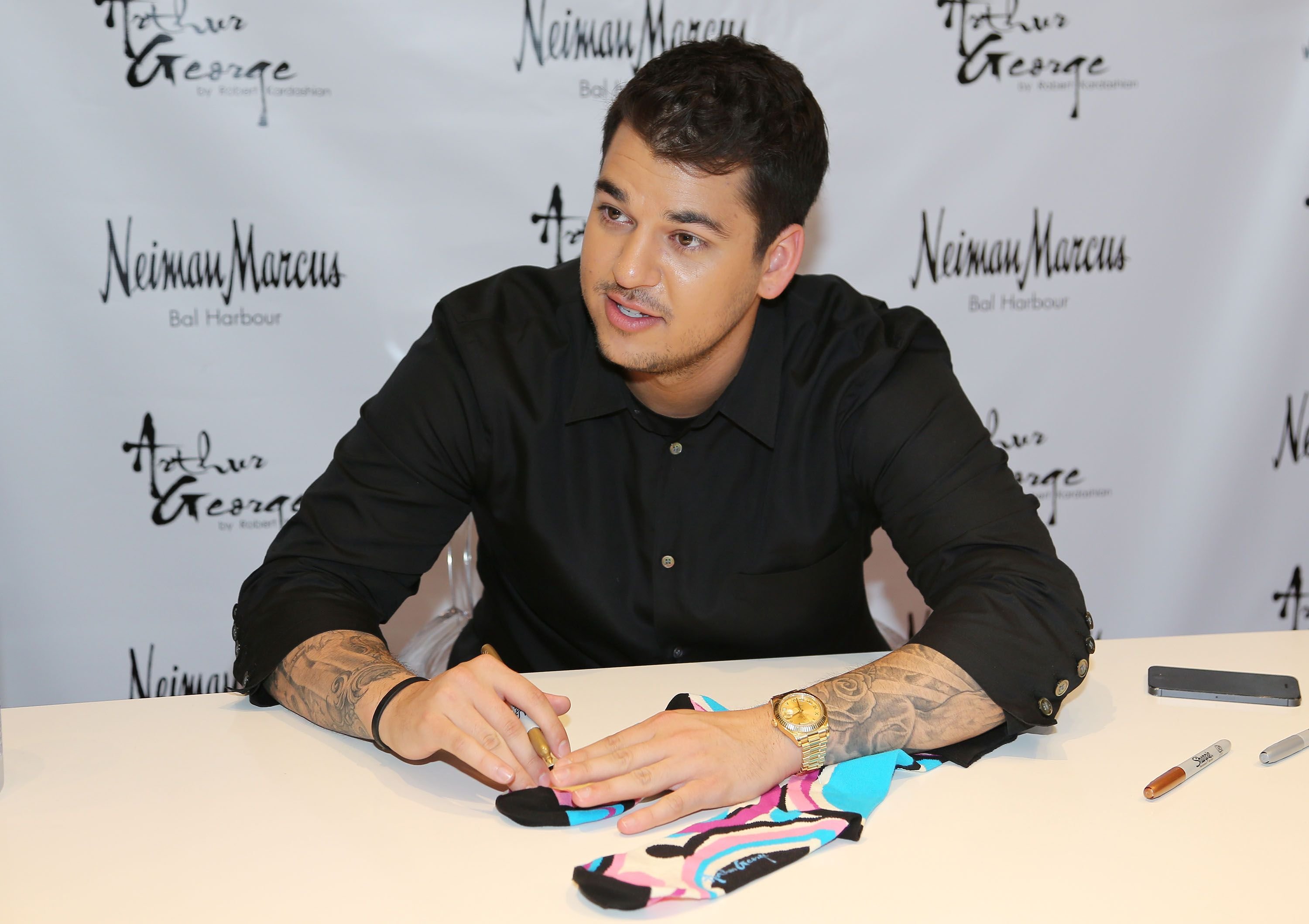 Reality star Rob Kardashian during his 2012 presentation of his Arthur George Socks Collection at the Neiman Marcus Bal Harbour in Miami Beach, Florida. | Photo: Getty Images