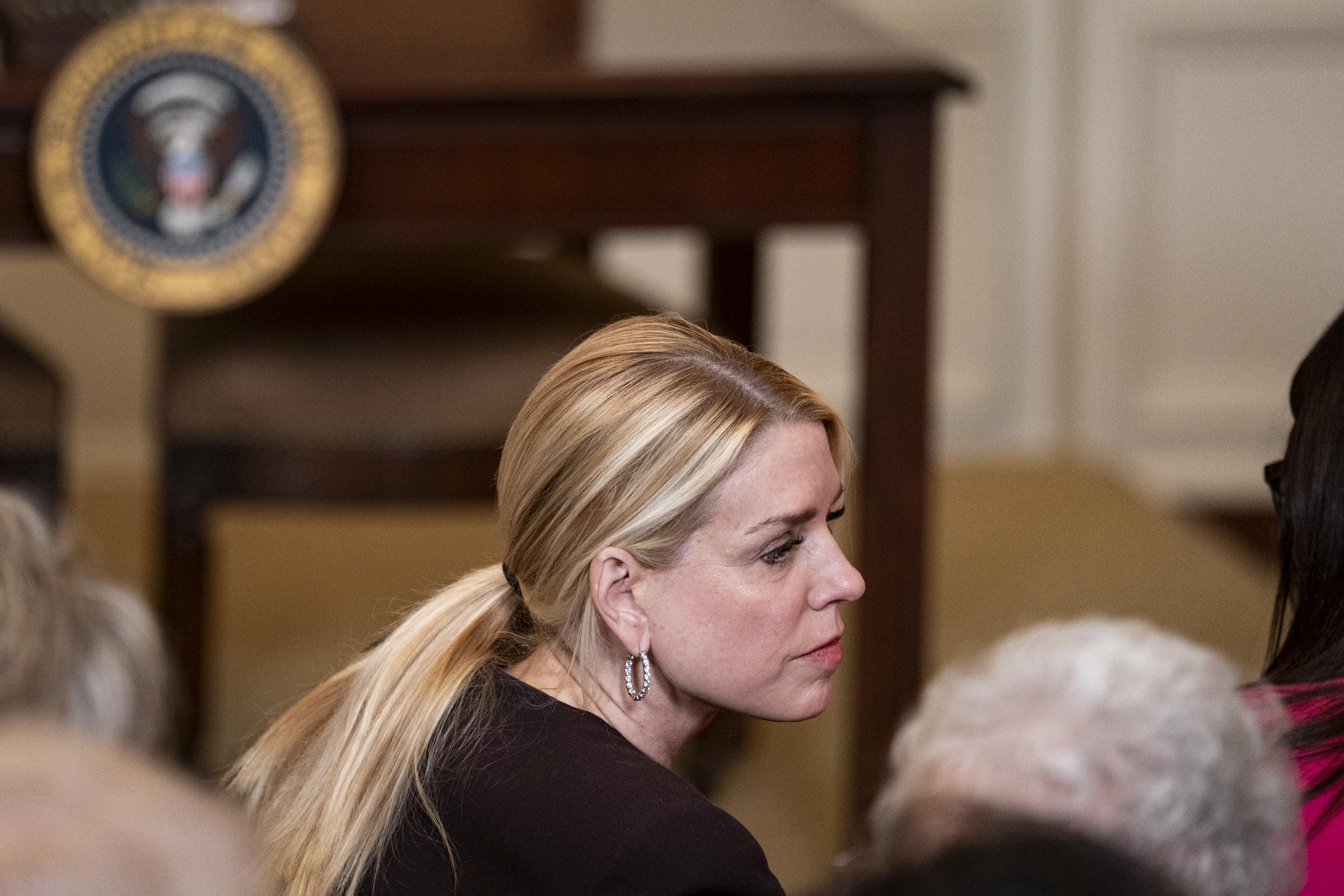 The then-Attorney General Pam Bondi attends a Women's History Month event in the East Room of the White House on March 12, 2026. | Source: Getty Images