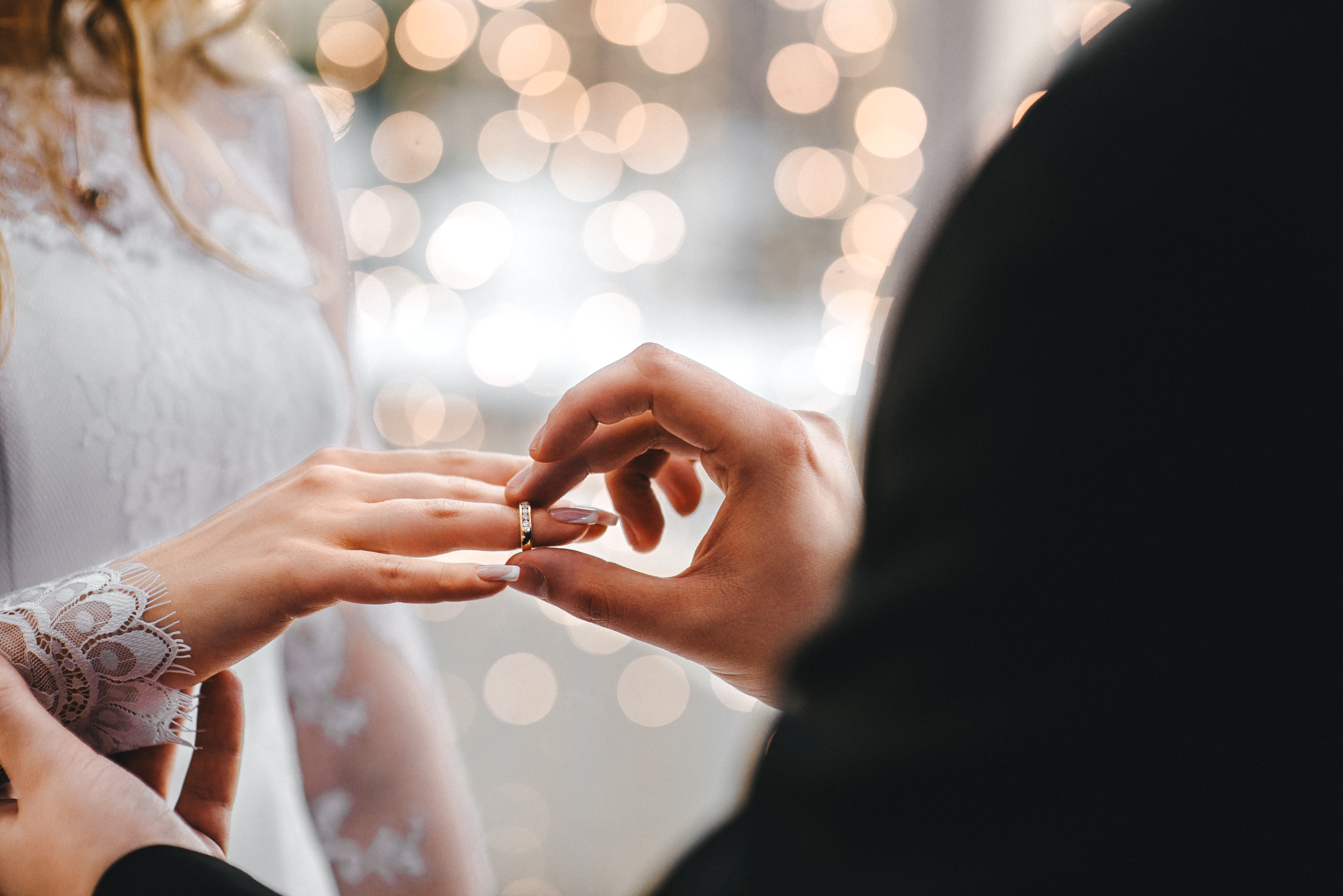 A couple exchanging rings | Source: Shutterstock