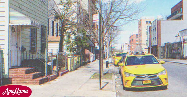 A taxi parked on the street | Source: Shutterstock