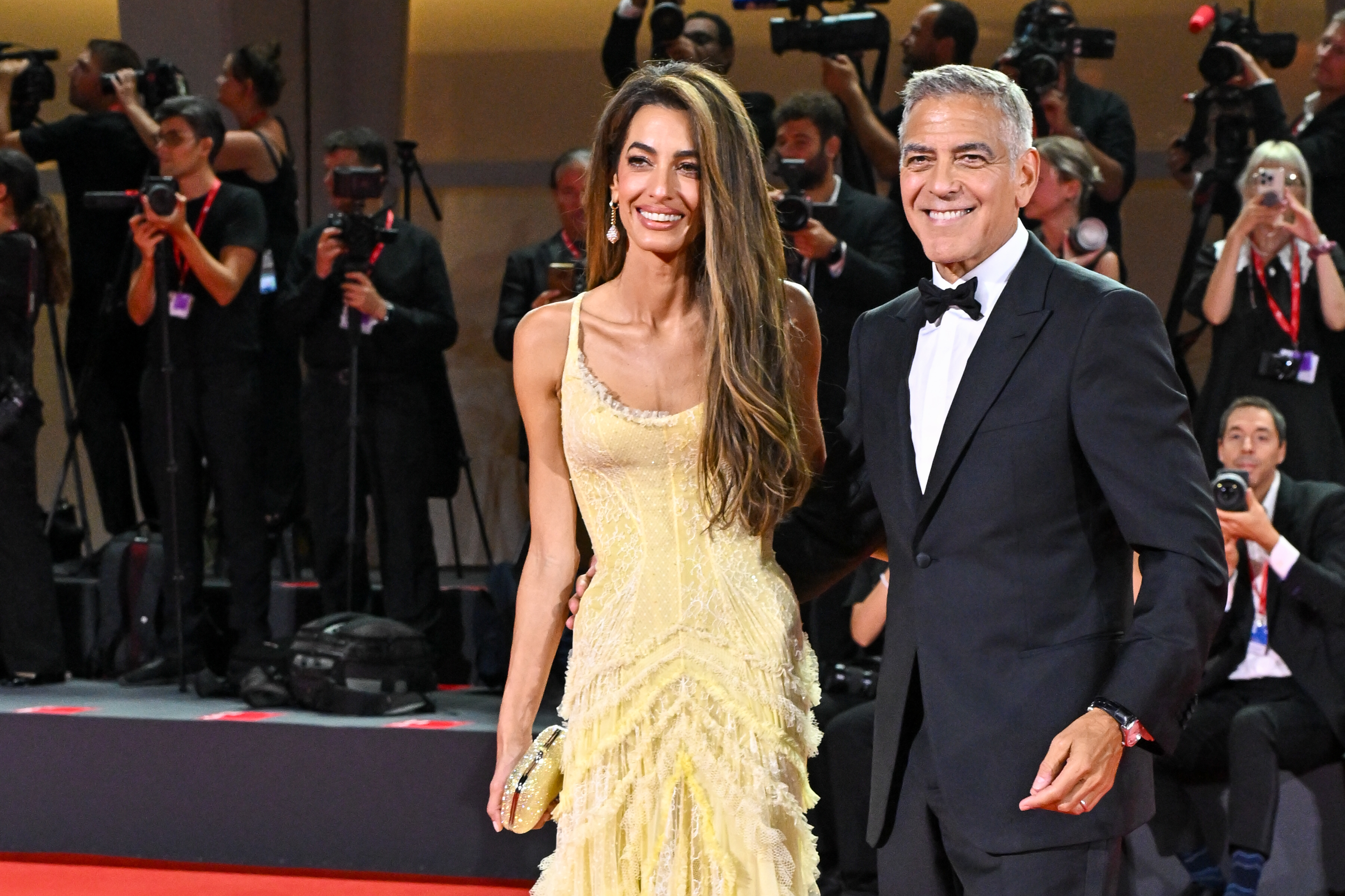 Amal Clooney and George Clooney attend the "Wolfs" red carpet during the 81st Venice International Film Festival on September 1, 2024, in Venice, Italy | Source: Getty Images