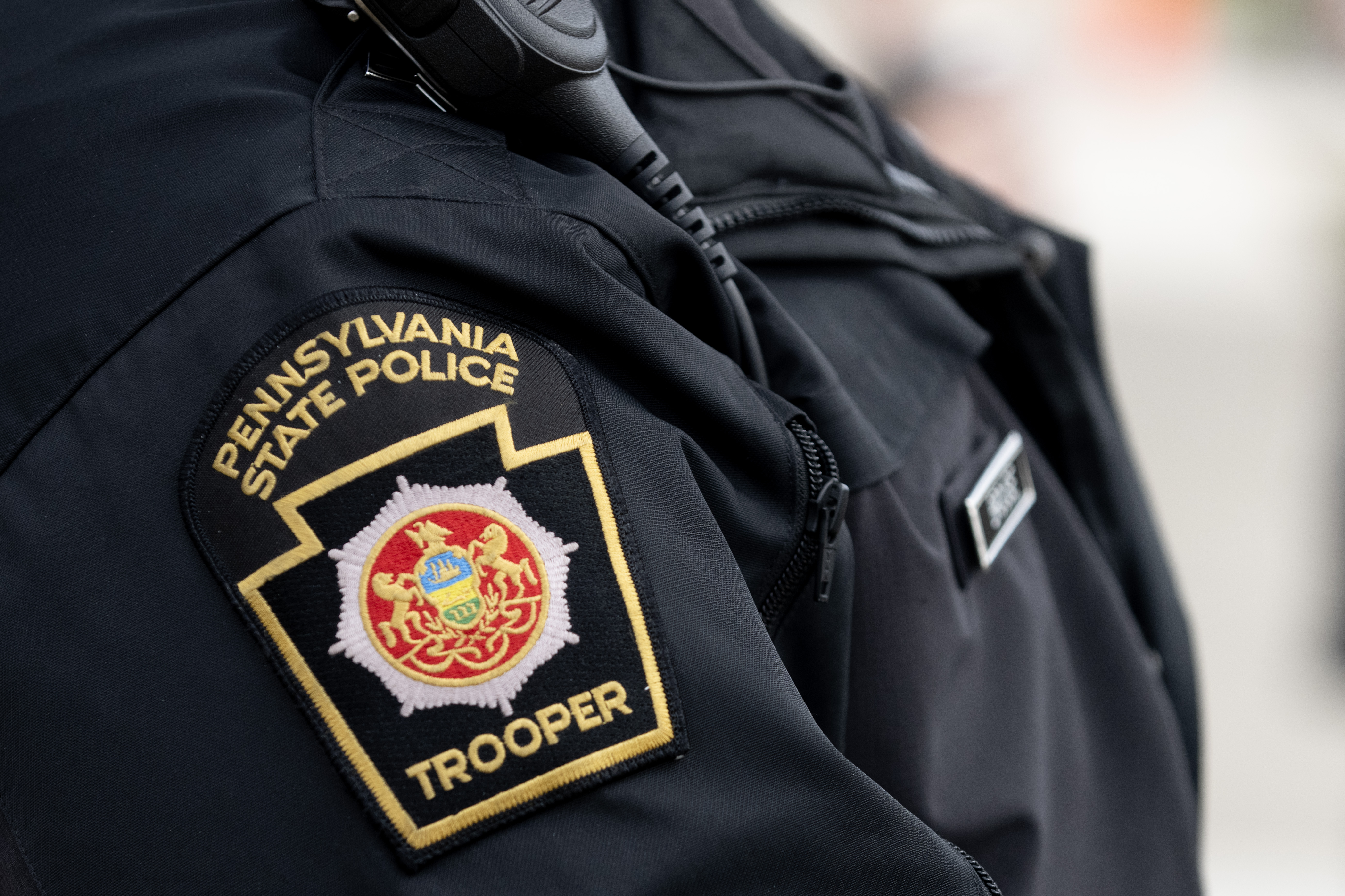 A close-up of a Pennsylvania State policeman's attire outside of St. Joseph Catholic Church in Downingtown, Pennsylvania on March 17, 2026. | Source: Getty Images