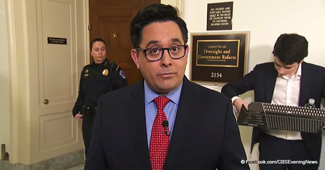 Guy Becomes a Star after Getting Caught on CBSN Live While Eating Pizza at Cohen's Hearing