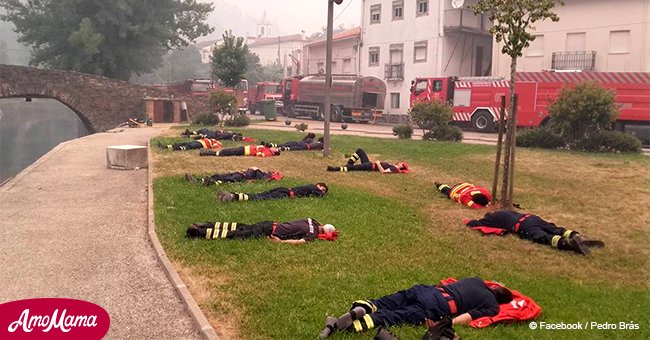 Photo of firefighters laying across the lawn goes viral