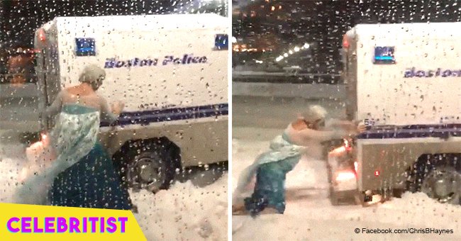 Here’s the story behind the video of man dressed as Elsa from 'Frozen' pushing police truck in snow